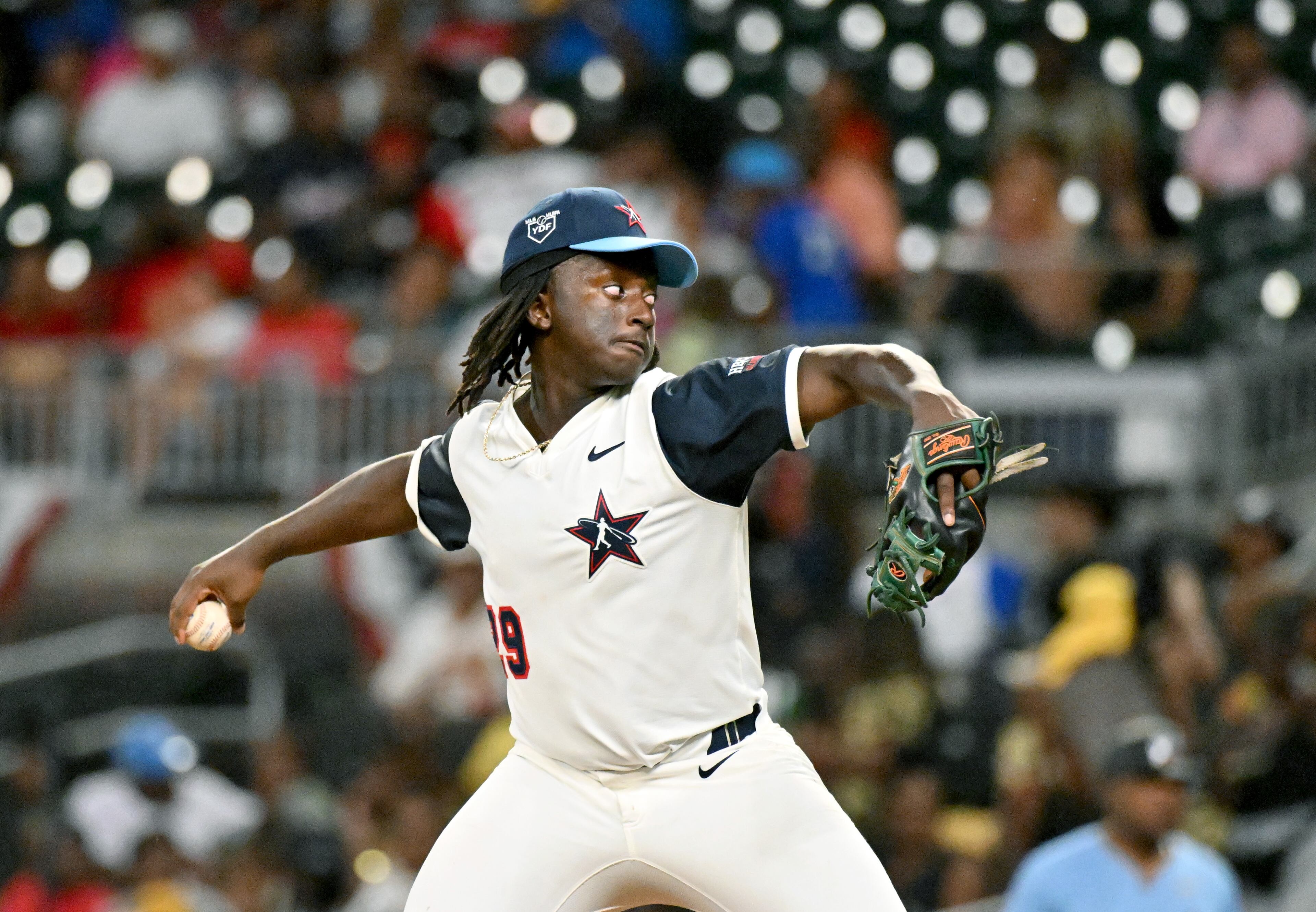 National League's third baseman/right-handed pitcher Jay Campbell of Florida A&M (29) throws a ball during the ninth inning of HBCU Swingman Classic at Truist Park, Friday, July 11, 2025, in Atlanta. National League won 7-4 over American League. (Hyosub Shin / AJC)