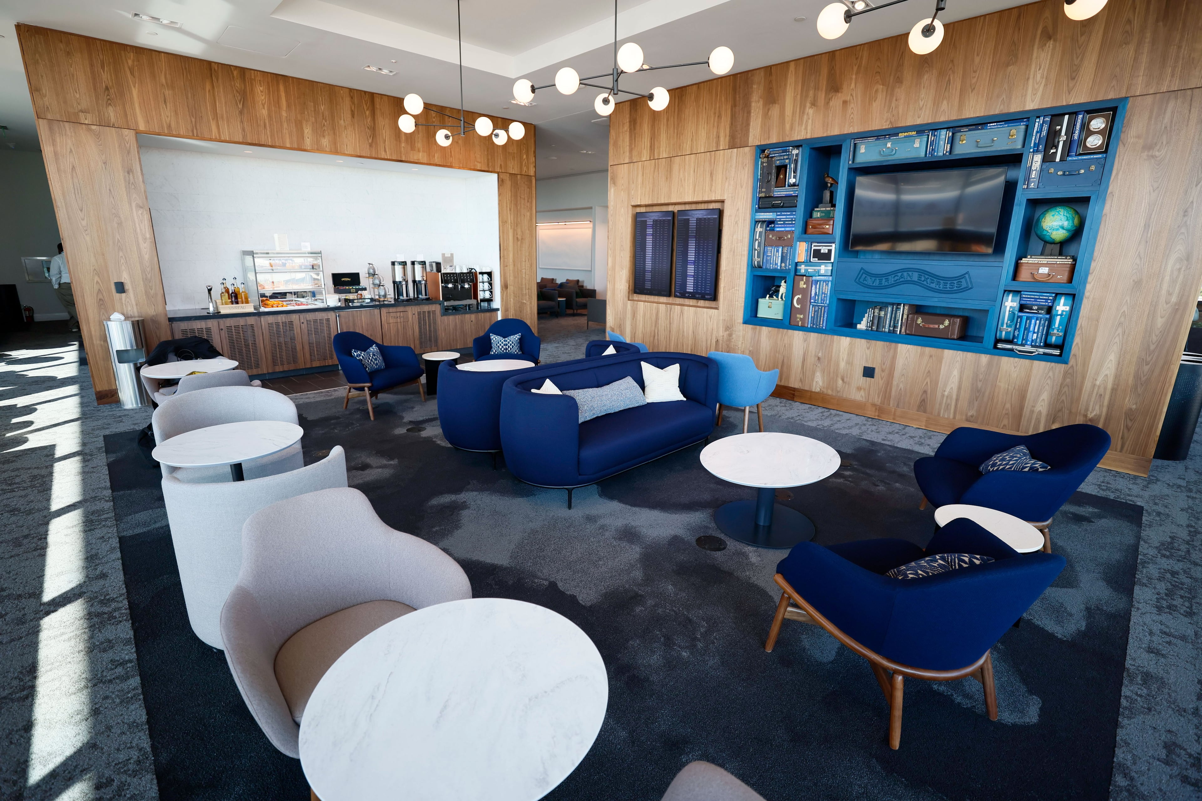 The Centurion Lounge at Hartsfield-Jackson International Airport is decorated with art by local artists and nods to Atlanta and Georgia. Miguel Martinez /miguel.martinezjimenez@ajc.com