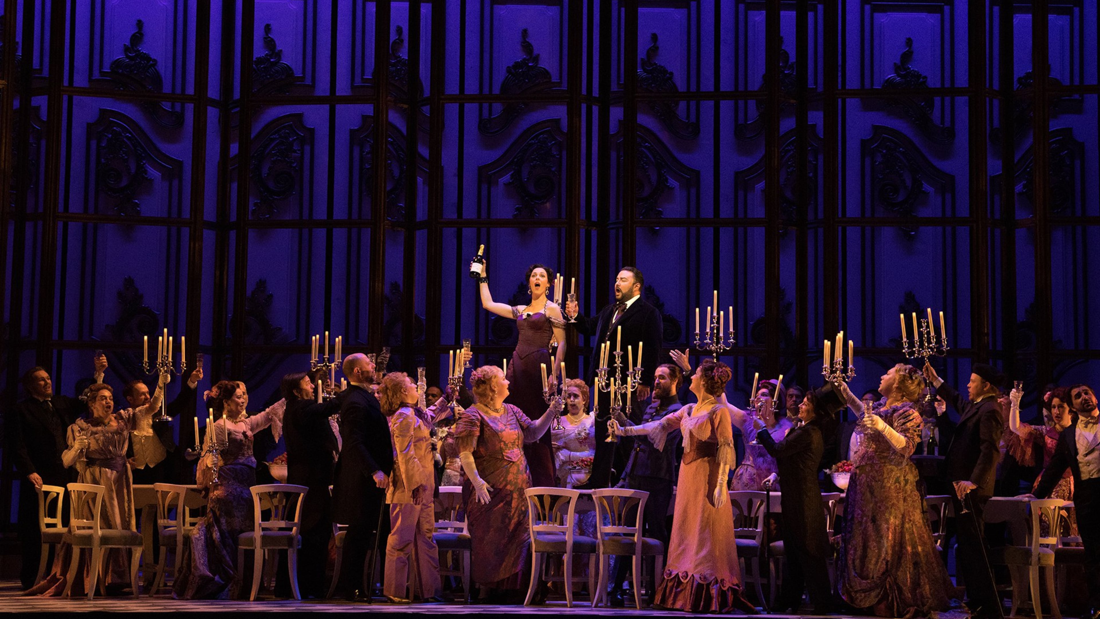 Zuzana Marková performs as Violetta and Mario Chang performs as Alfredo with members of the Atlanta Opera Chorus in the Atlanta Opera’s new production of “La Traviata” at the Cobb Energy Performing Arts Centre. Contributed by Nunnally Rawson