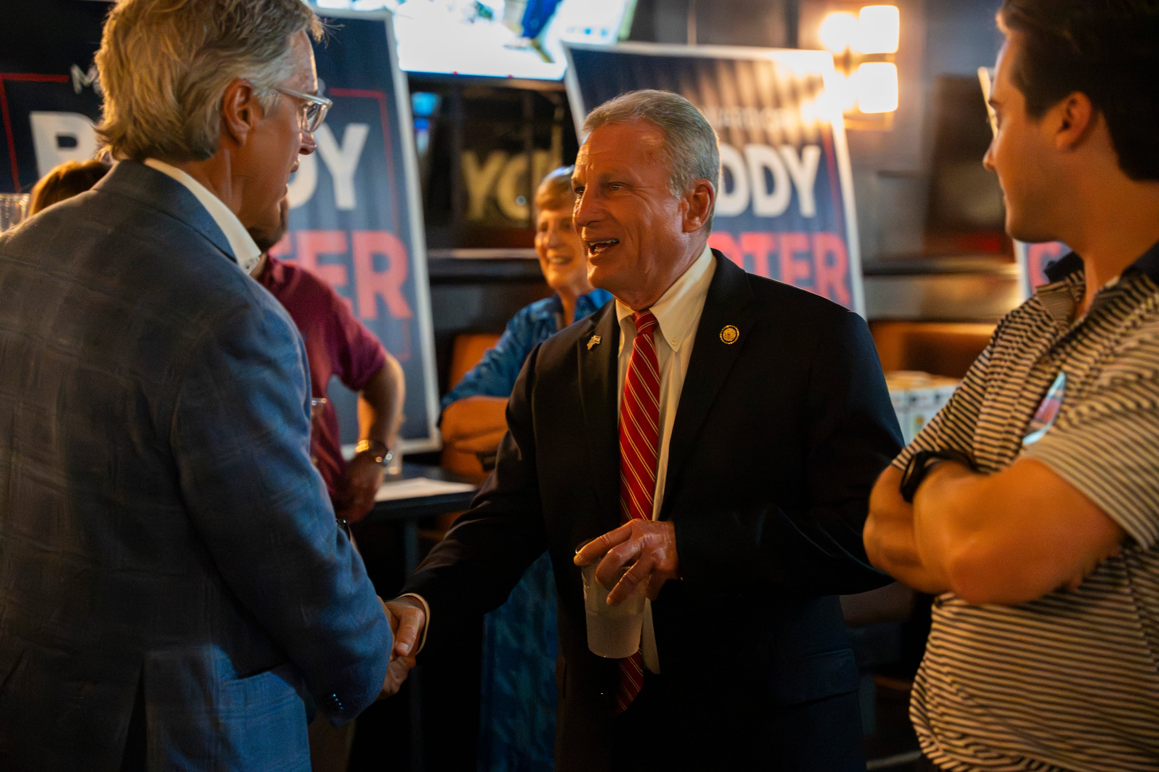 Buddy Carter greets supporters while watching election results during an election night watch party Tuesday, May 19, 2026, in Sandy Springs, Ga. (Olivia Bowdoin for the AJC)