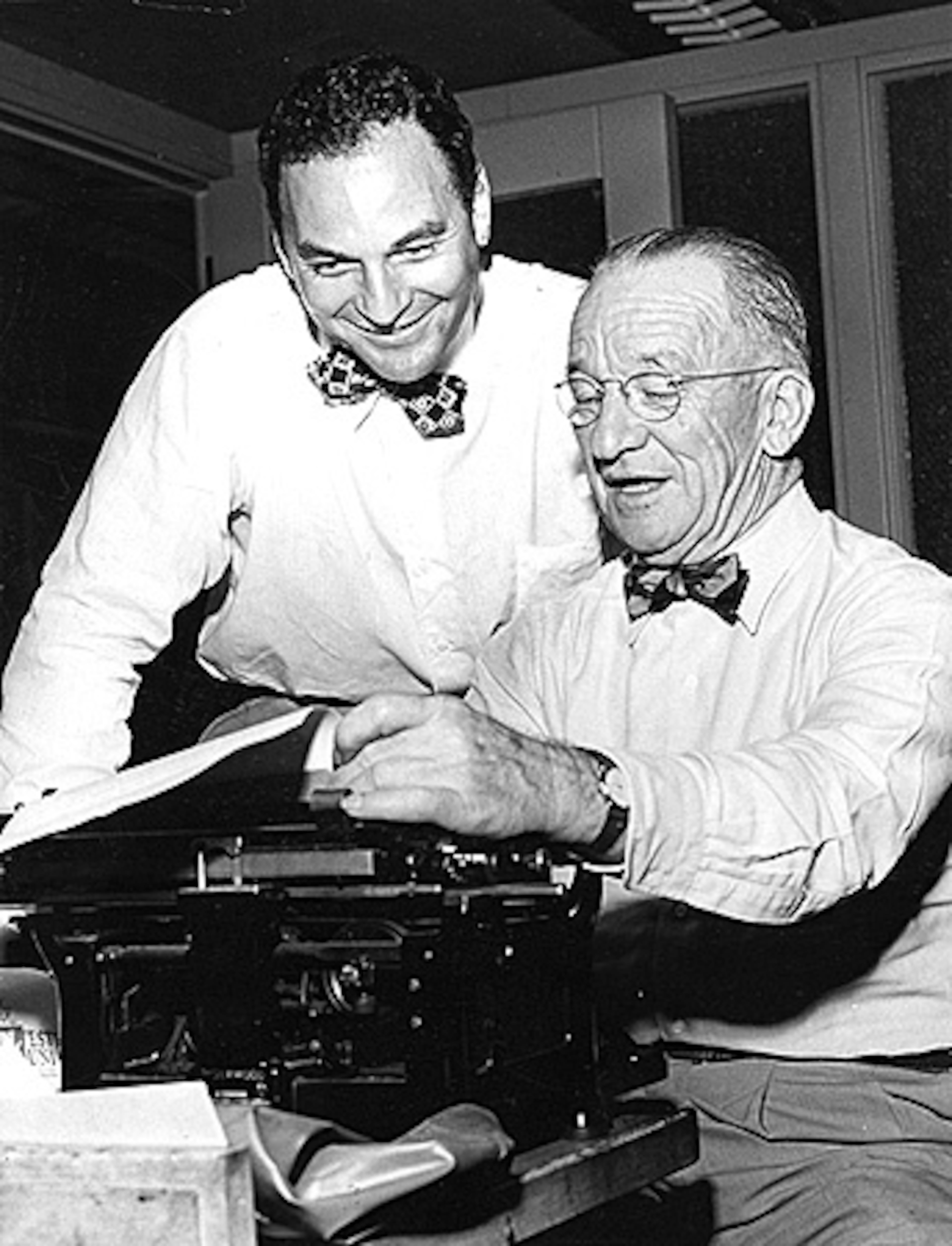 Bisher with longtime Atlanta sportswriter and editor Ed Danforth. Former Journal sportswriter Lee Walburn used to retype Bisher's columns to practice his style, "just to feel his words flow through my fingers." Like many reporters under Bisher's charge, Walburn admitted at times his boss instilled fear in him.