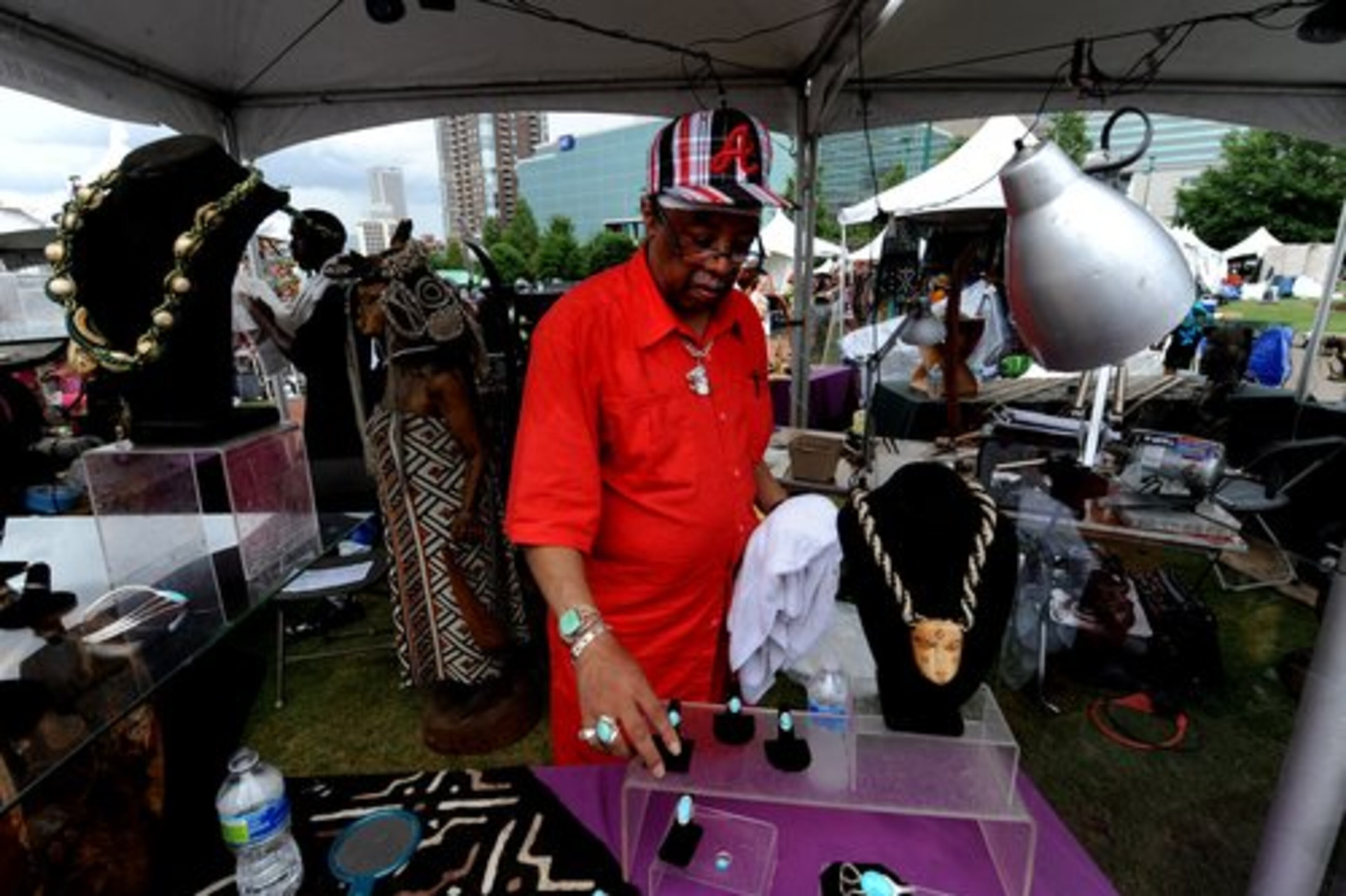 .... or participant David Pearson, who dried off his items after the rain and placed them back on display.