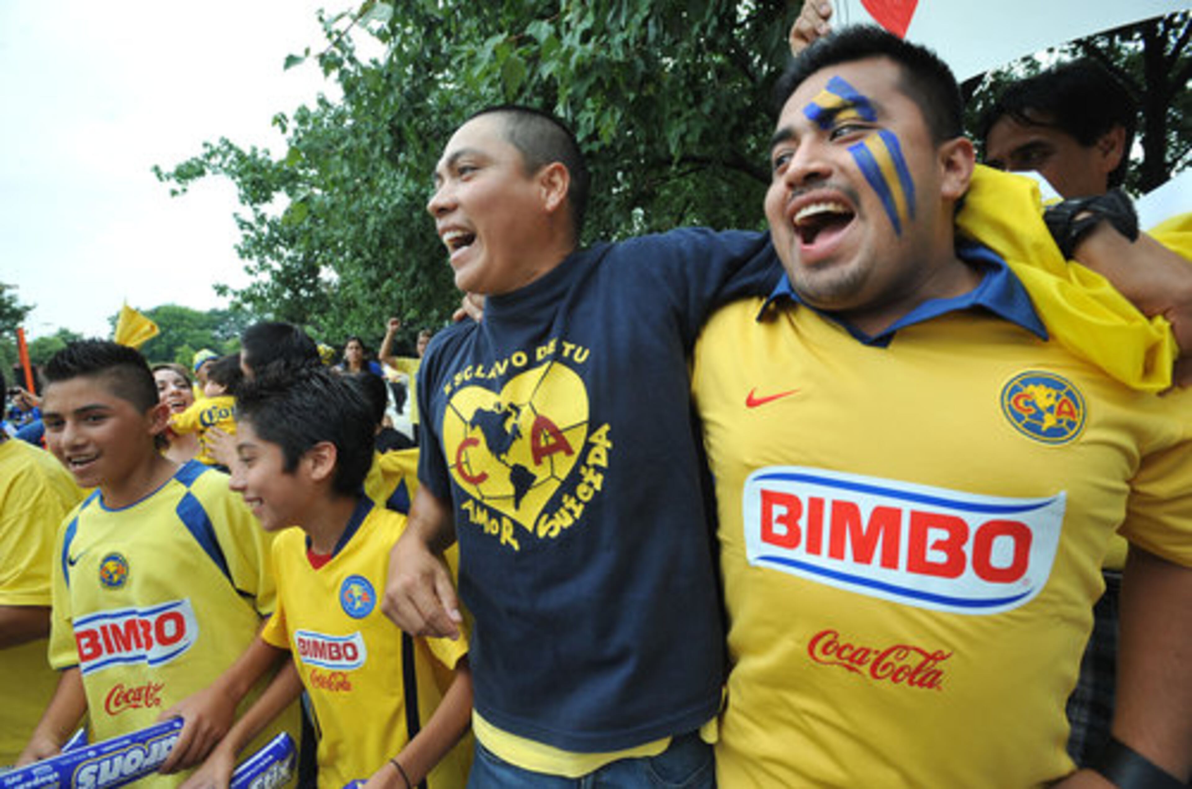 An estimated 55,000 soccer fans were expected at the Georgia Dome on Wednesday night for the World Football Challenge match between AC Milan and Club America. Nelson Vera of Norcross and his friend Caros Morales of Tlaxcala, Mexico, are in the spirit.