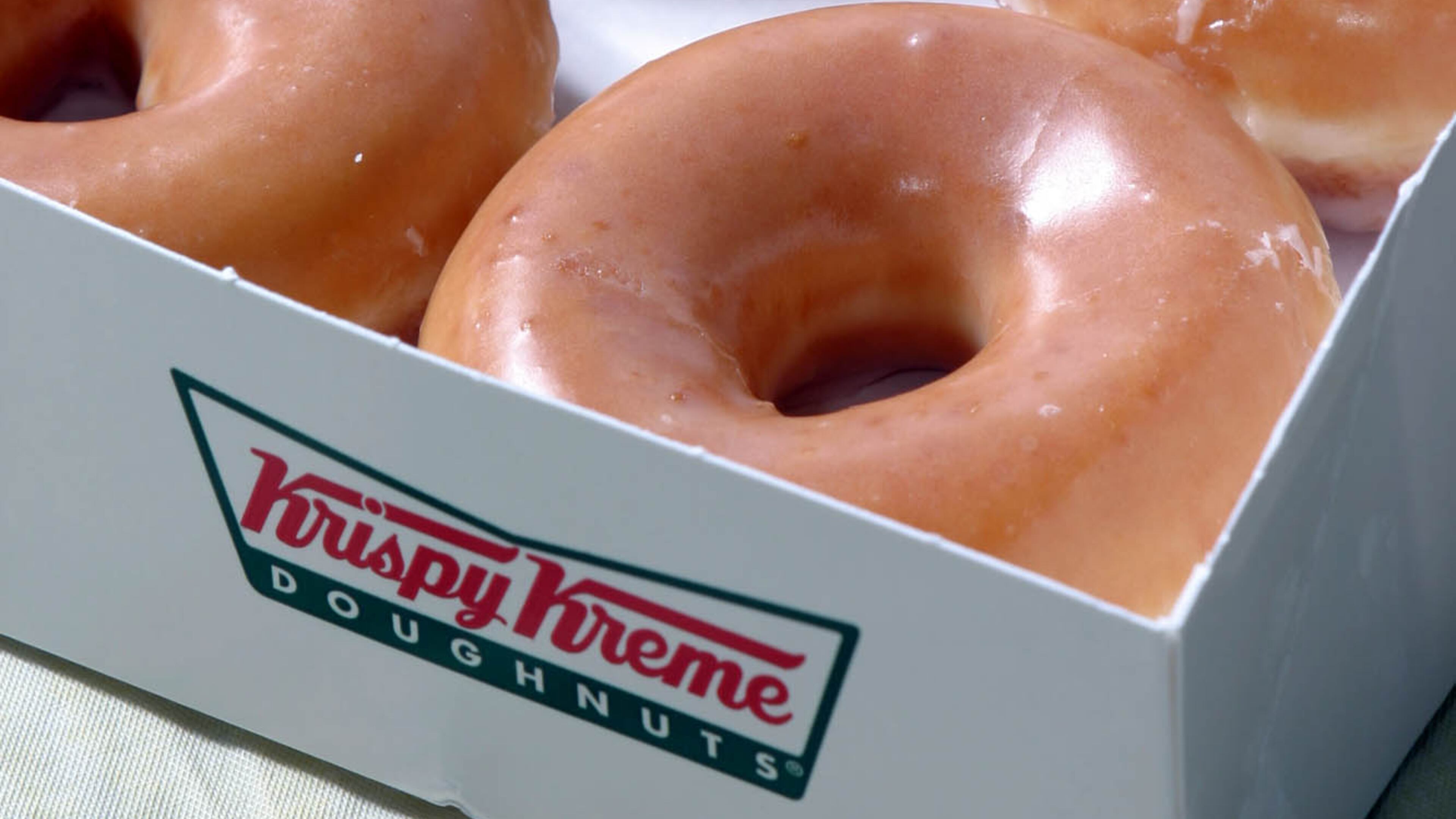 Krispy Kreme glazed dougnuts are shown, Wednesday, Nov. 10, 2004, in Charlotte, N.C. Shares of Krispy Kreme Doughnuts Inc.'s fell sharply Monday as a 79 percent plunge in third quarter earnings and an intensifying accounting investigation overshadowed the pastry maker's statement that the low-carb craze might be easing. (AP Photo/Nell Redmond)