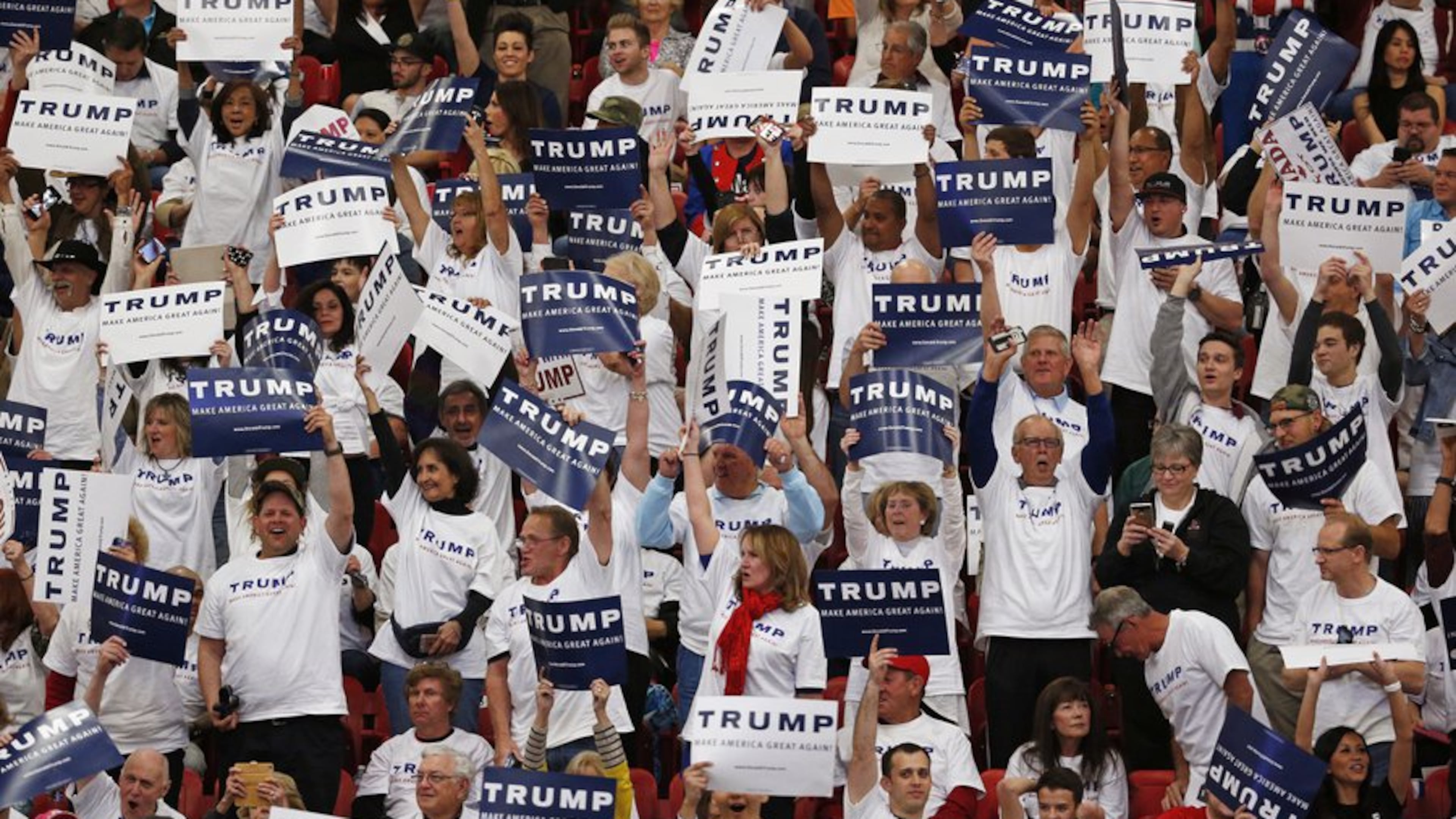 Supporters of Republican presidential candidate Donald Trump cheer before campaign rally Monday, Feb. 22, 2016, in Las Vegas. (AP Photo/John Locher)