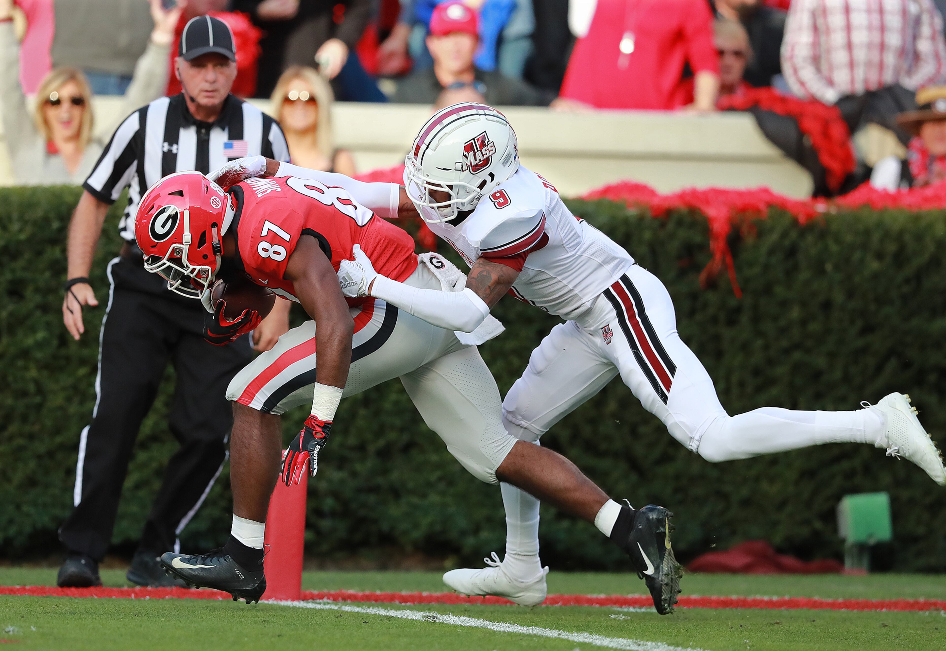 Nov 17, 2018 Athens: Georgia wide receiver Tyler Simmons gets past Massachusetts cornerback Isaiah Rodgers for a touchdown and a 7-0 lead during the first quarter in a NCAA college football game on Saturday, Nov. 17, 2018, in Athens. Curtis Compton/ccompton@ajc.com