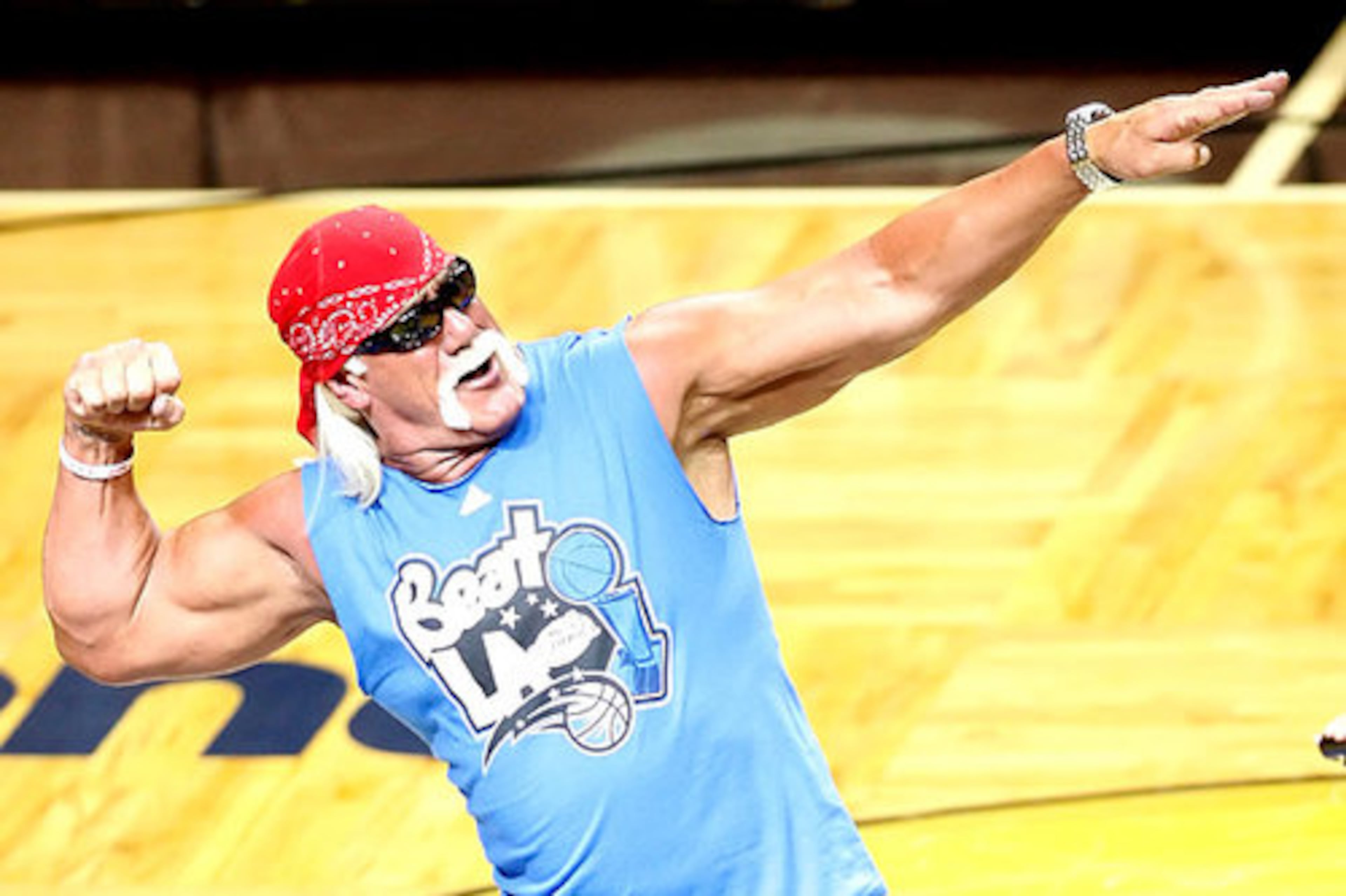 Wrestling with his own issues: Wrestler and reality star Hulk Hogan, pumping up the Orlando Magic crowd during a timeout.