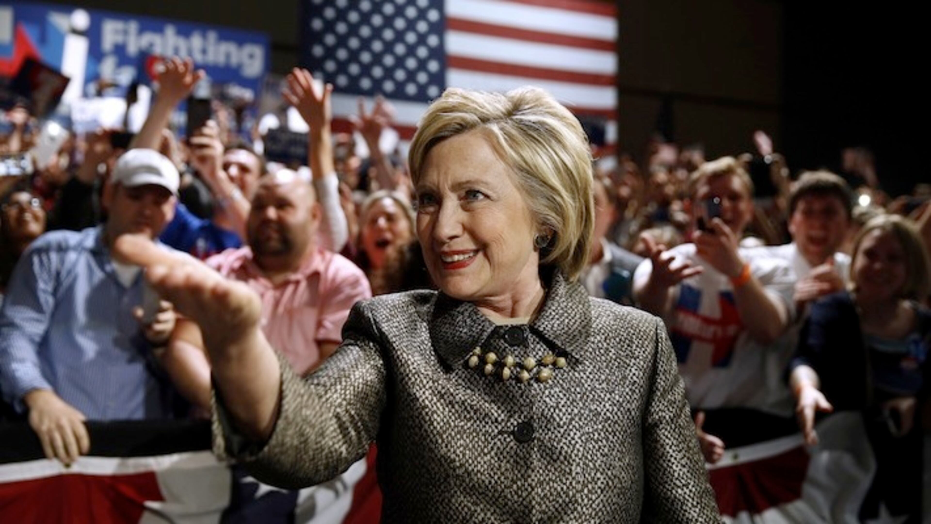 FILE - In this April 26, 2016 file photo, Democratic presidential candidate Hillary Clinton moves to the stage at her presidential primary election night rally in Philadelphia. Bernie Sanders defied expectations to turn his long-shot presidential bid into a real threat for the Democratic nomination. But as his path to the White House becomes all-but-impossible, some of his supporters are lashing out at a system they believe was engineered against them from the start. (AP Photo/Matt Rourke, File)