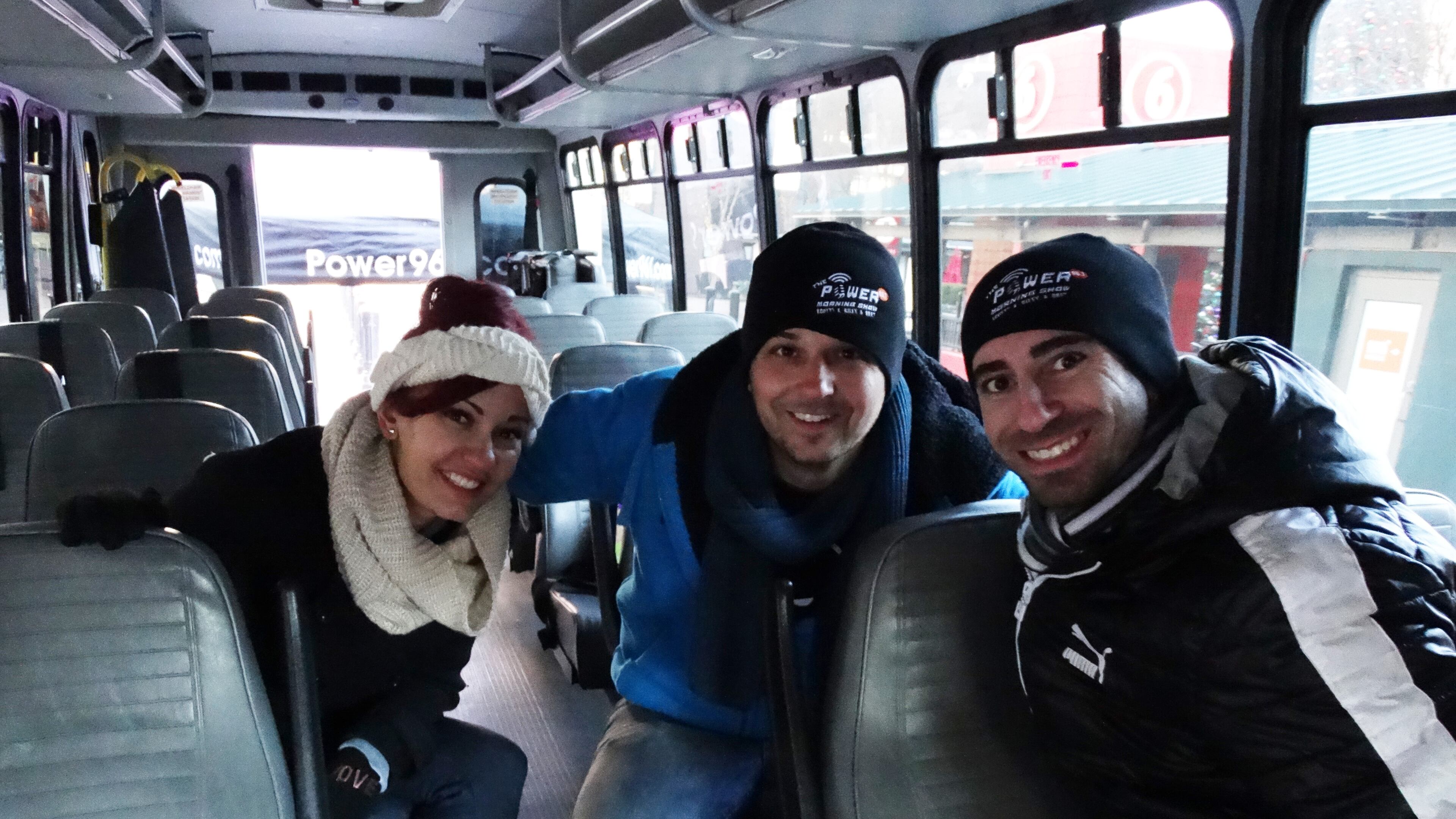Riley Couture (left), producer Bret Mega and Scotty Kay (right) at their first Stuff the Bus toy drive in December, 2014. CREDIT: Rodney Ho/ rho@ajc.com