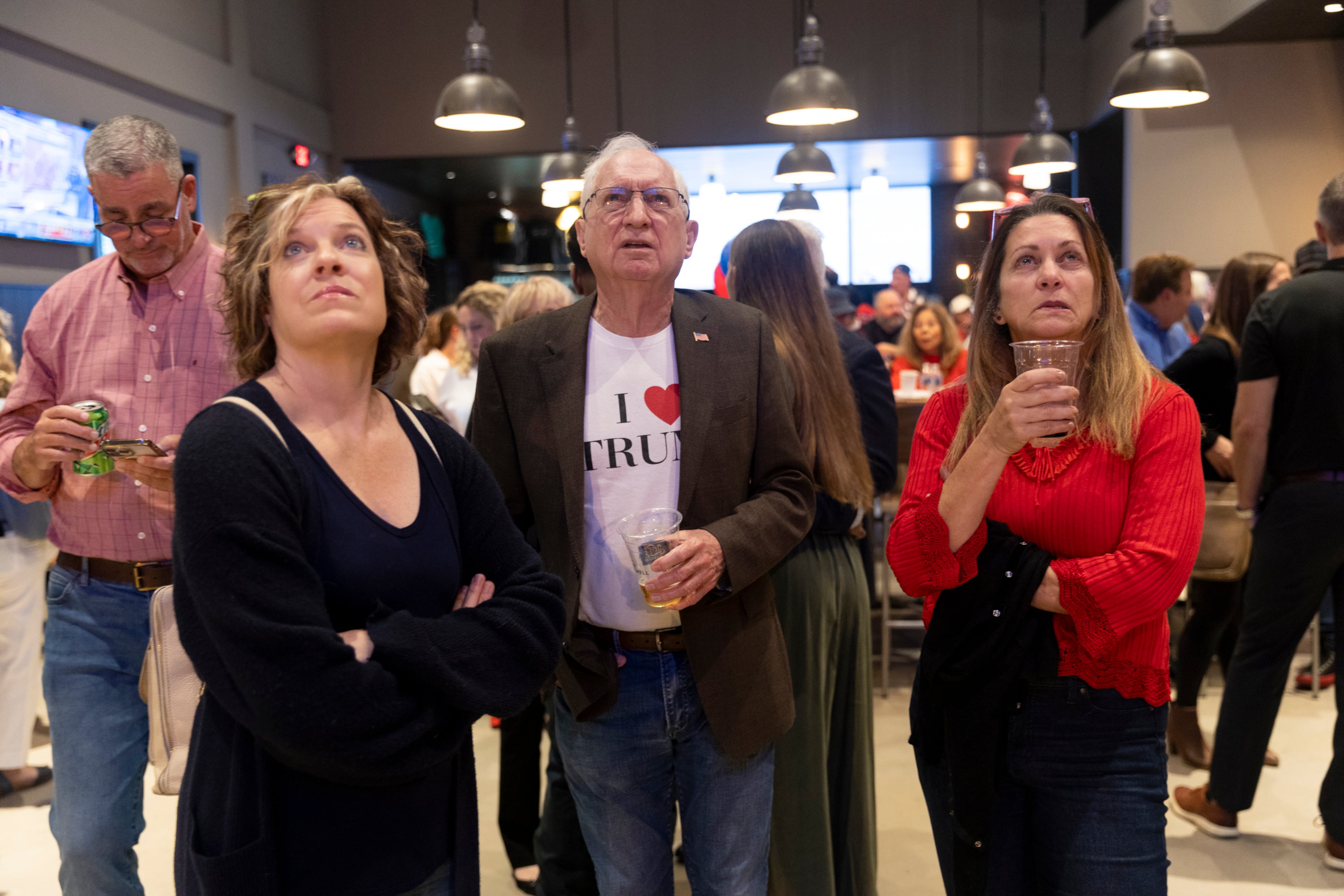 Republicans watch as the results come in at a GOP election night watch party in Cumming, Georgia on November 5, 2024. (Nathan Posner for the Atlanta Journal-Constitution)