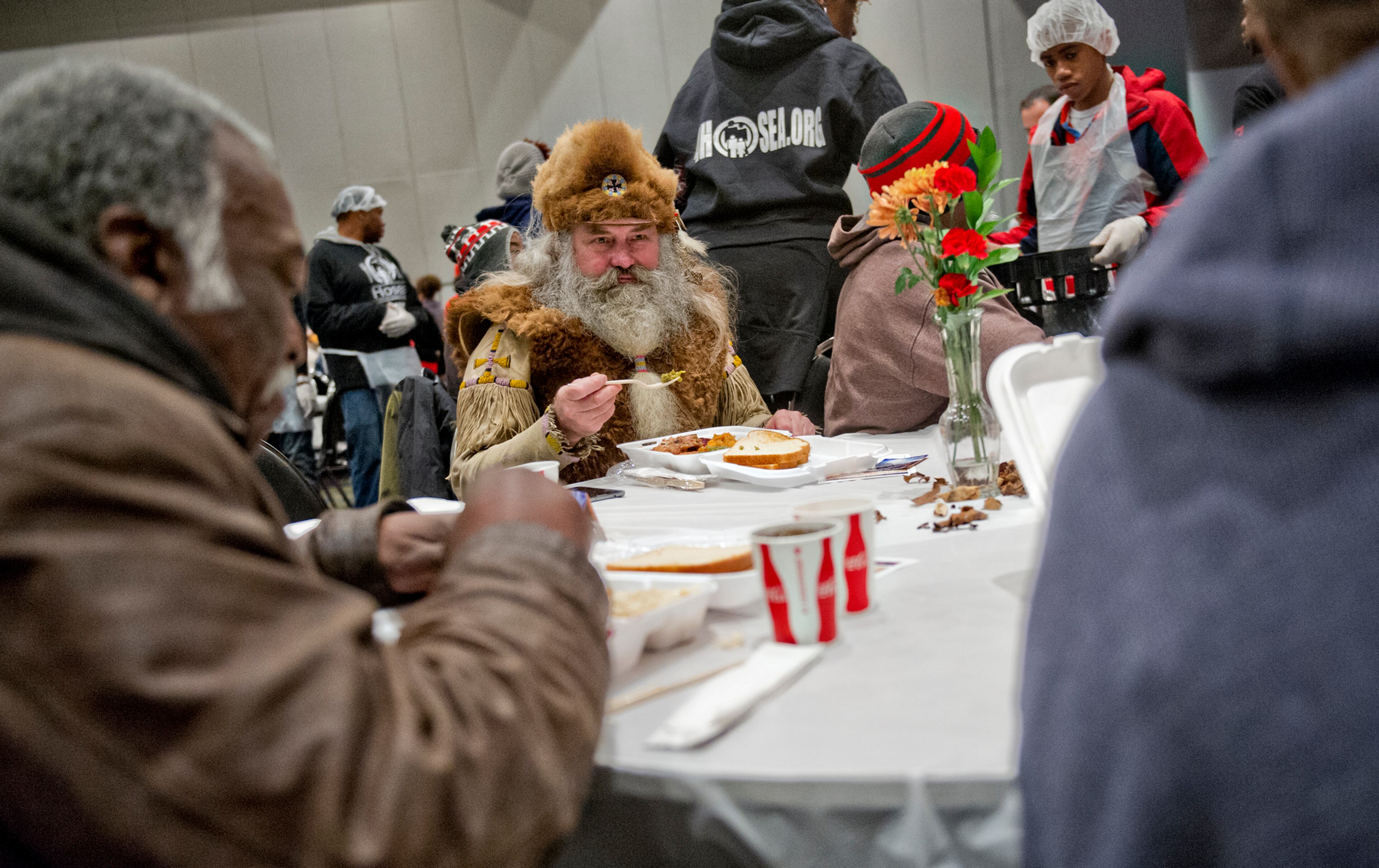 James Vesterfelt (center) takes a bite of his meal.