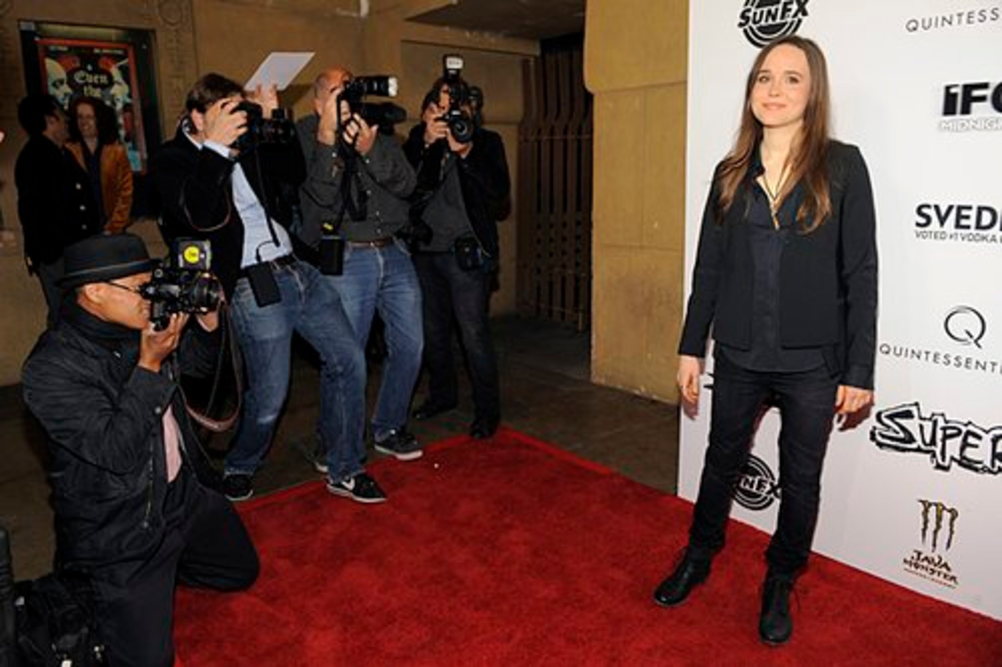 Castmember Ellen Page poses for photographers.