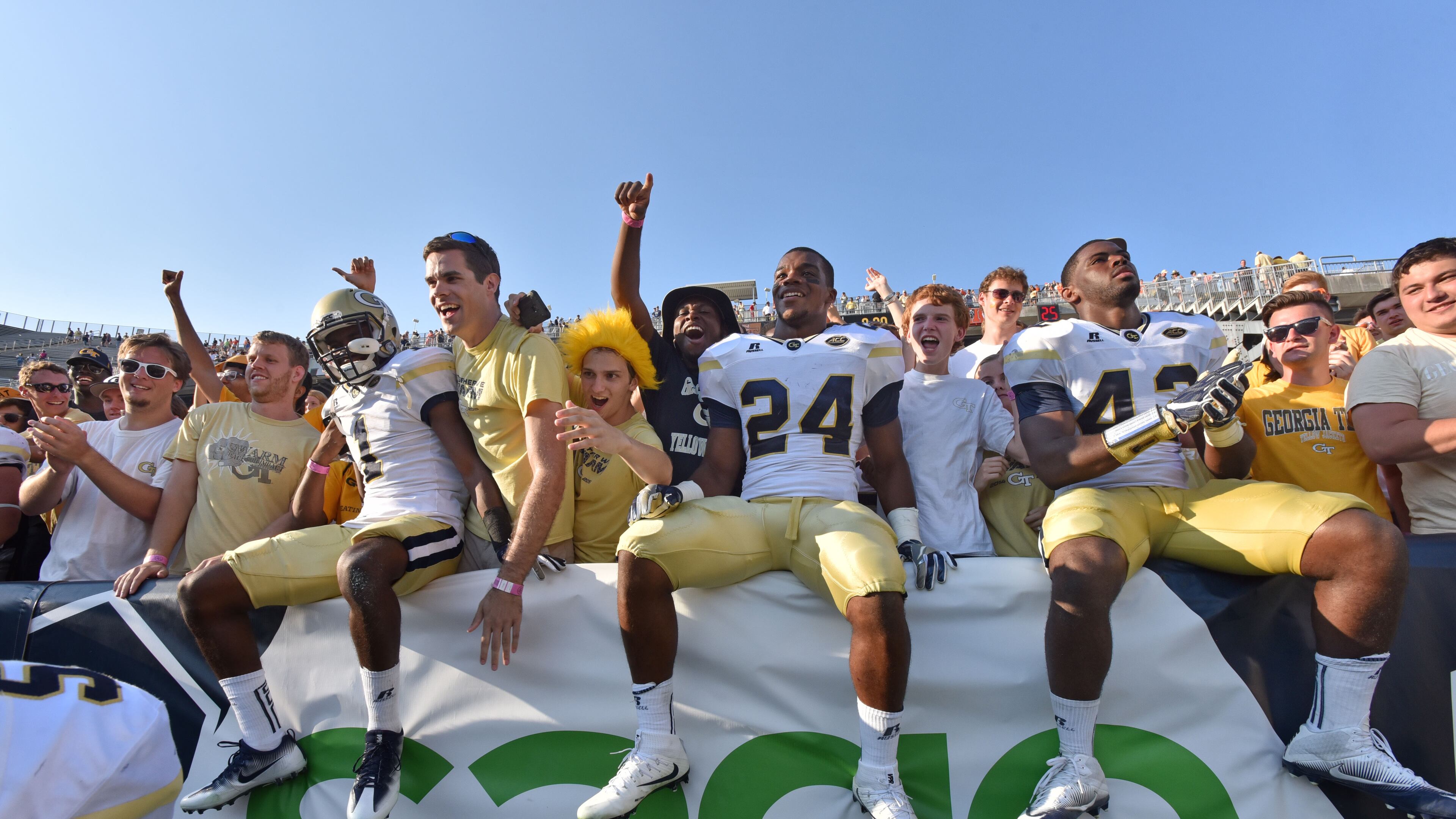 September 10, 2016 Atlanta - Georgia Tech Yellow Jackets players and fans celebrate their victory over the Mercer Bears at Bobby Dodd Stadium on Saturday, September 10, 2016. HYOSUB SHIN / HSHIN@AJC.COM