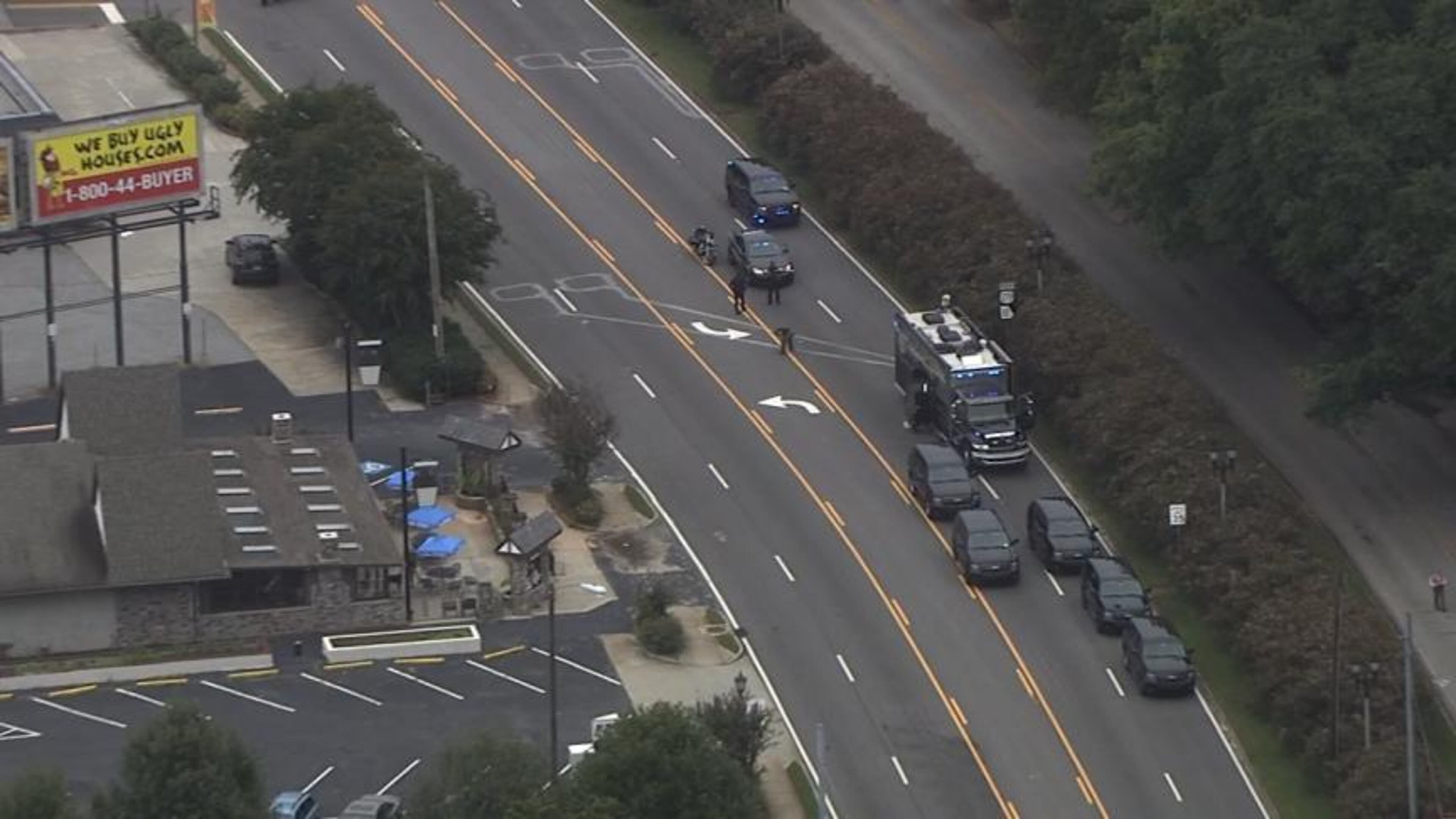 Four blocks of East College Avenue near the Twin Oaks Shopping Center have been blocked while authorities conduct a suspicious device investigation. (Credit: Channel 2 Action News)