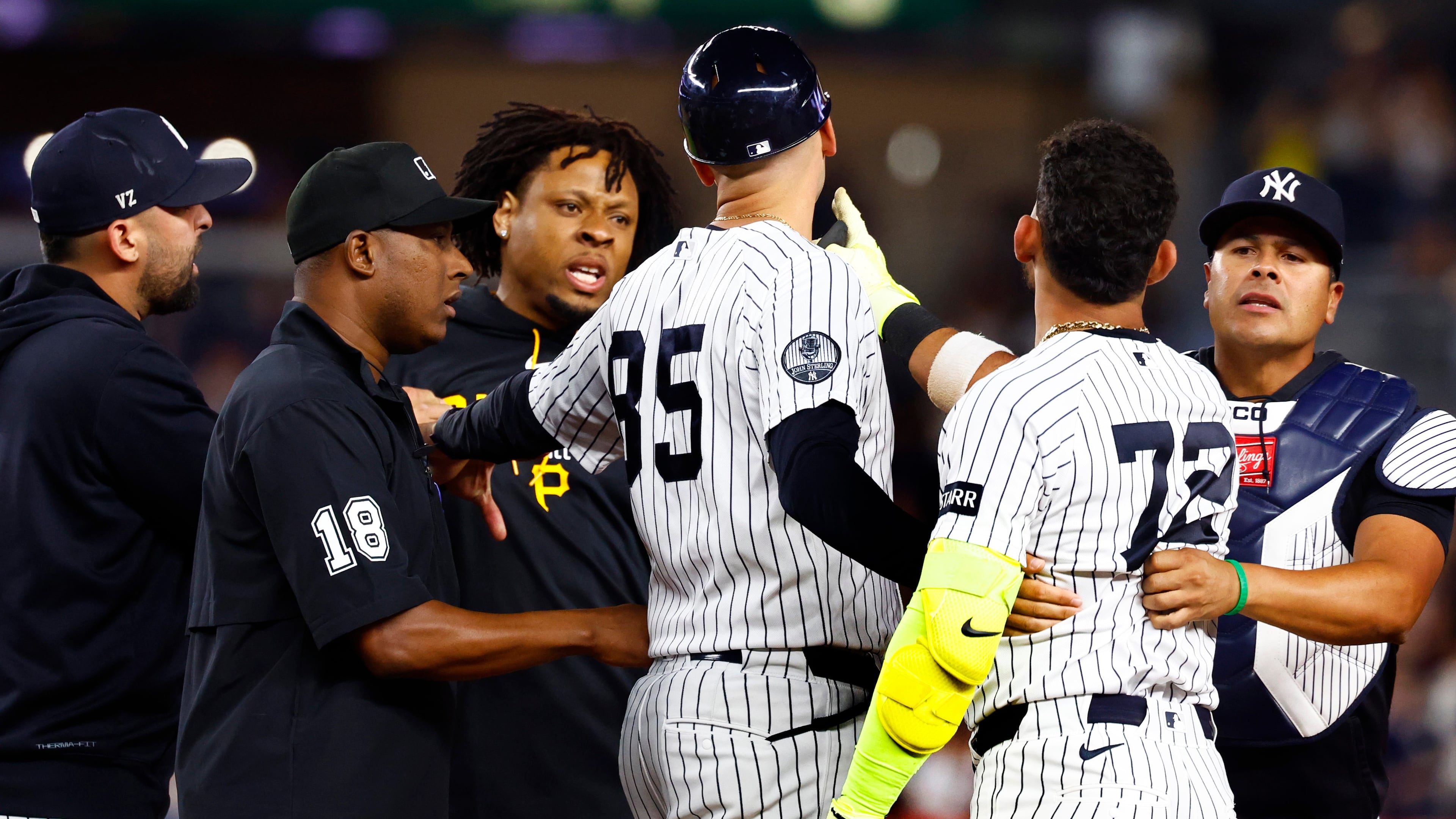Pittsburgh Pirates' Gregory Soto, left, exchanges words with New York Yankees' José Caballero (72), right, during the ninth inning of a baseball game, Monday, July 20, 2026 in New York. (AP Photo/Noah K. Murray)