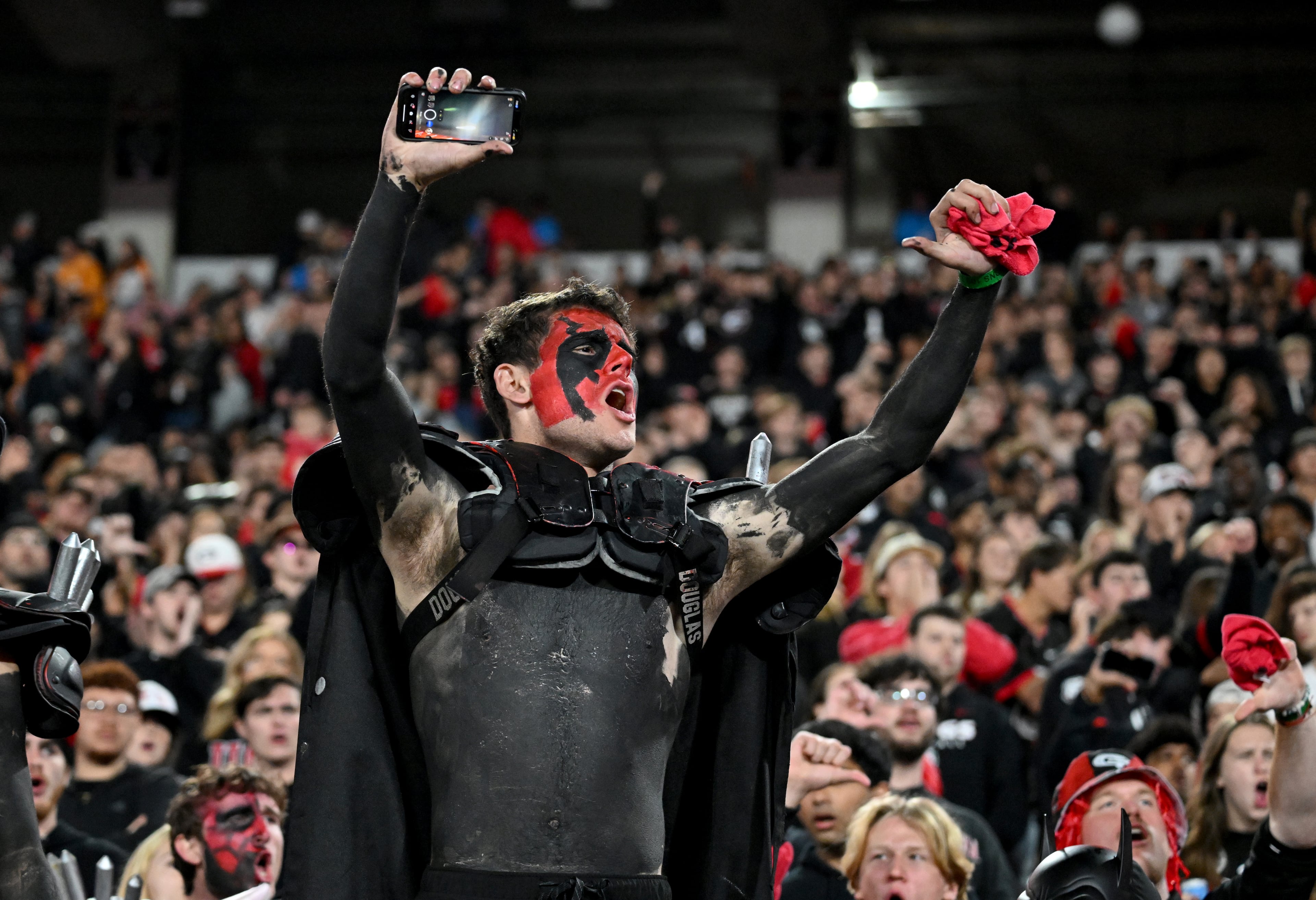 Georgia fans cheer before an NCAA football game between Georgia and Tennessee at Sanford Stadium, Saturday, November 16, 2024, in Athens. (Hyosub Shin / AJC)