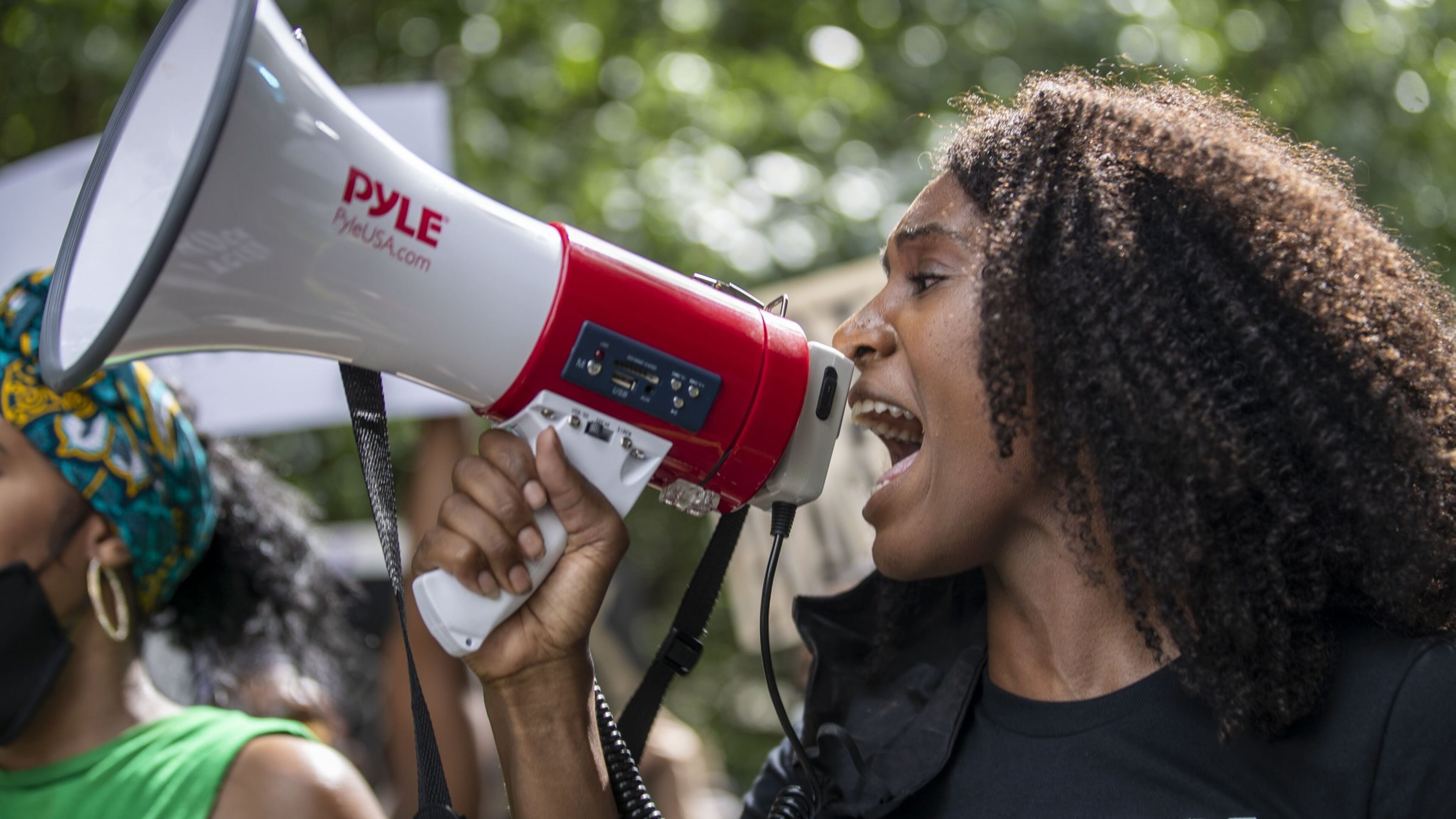 A protestor chants during a peaceful protest march from Cleopas Park to Atlanta City Hall, Sunday, June 7, 2020. (ALYSSA POINTER / ALYSSA.POINTER@AJC.COM)