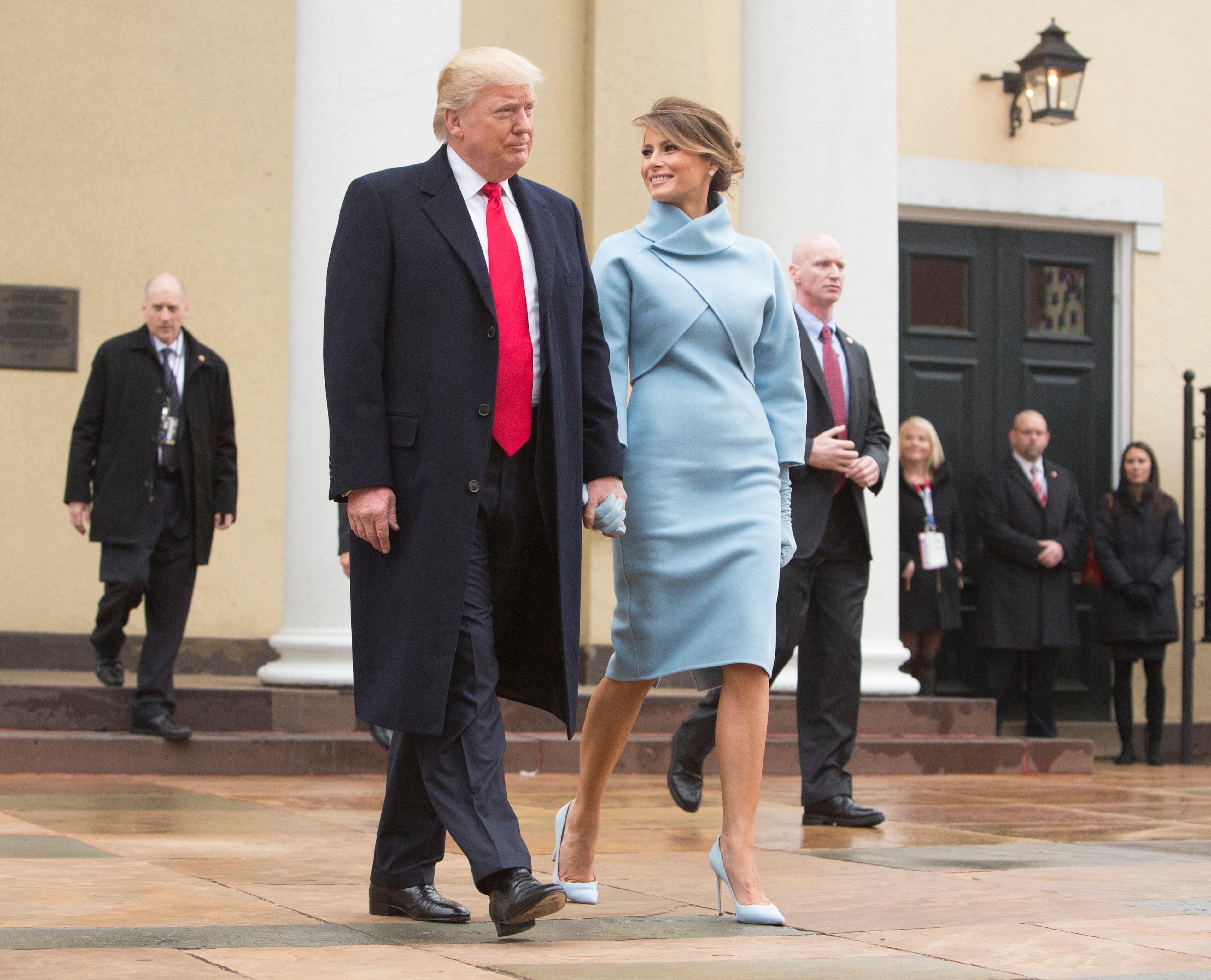 WASHINGTON, DC - JANUARY 20: President-elect Donald J. Trump and first lady-elect Melania Trump depart St. John's Church on Inauguration Day on January 20, 2017 in Washington, DC. Donald J. Trump will become the 45th president of the United States today. (Photo by Chris Kleponis - Pool/Getty Images)