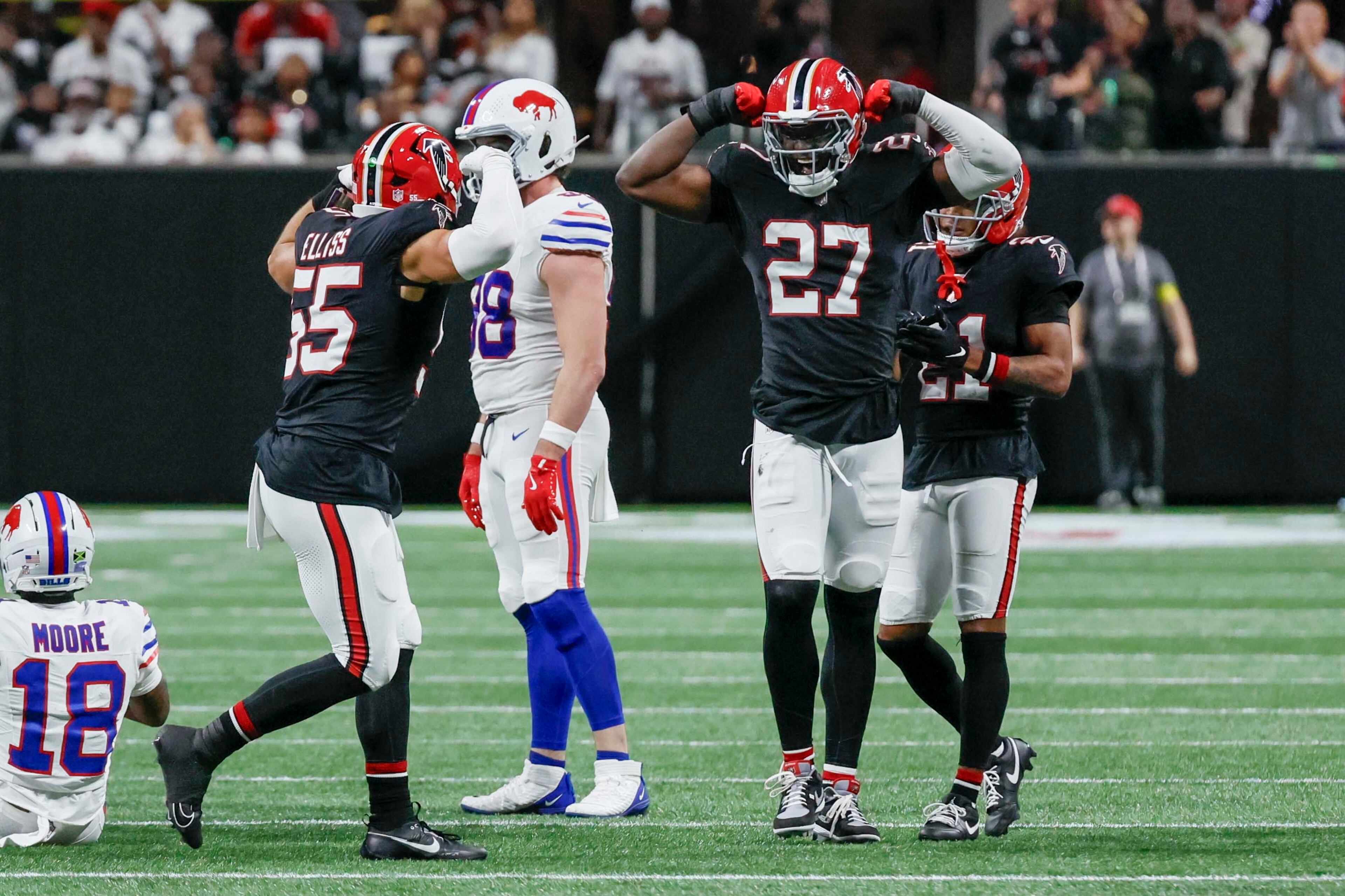 Atlanta Falcons defensive end James Pearce Jr. (27) reacts with Atlanta Falcons linebacker Kaden Elliss (55) after a sack during the first half of an NFL football game against the Buffalo Bills at Mercedes-Benz Stadium in Atlanta on Monday, October 13, 2025.
(Miguel Martinez/ AJC)