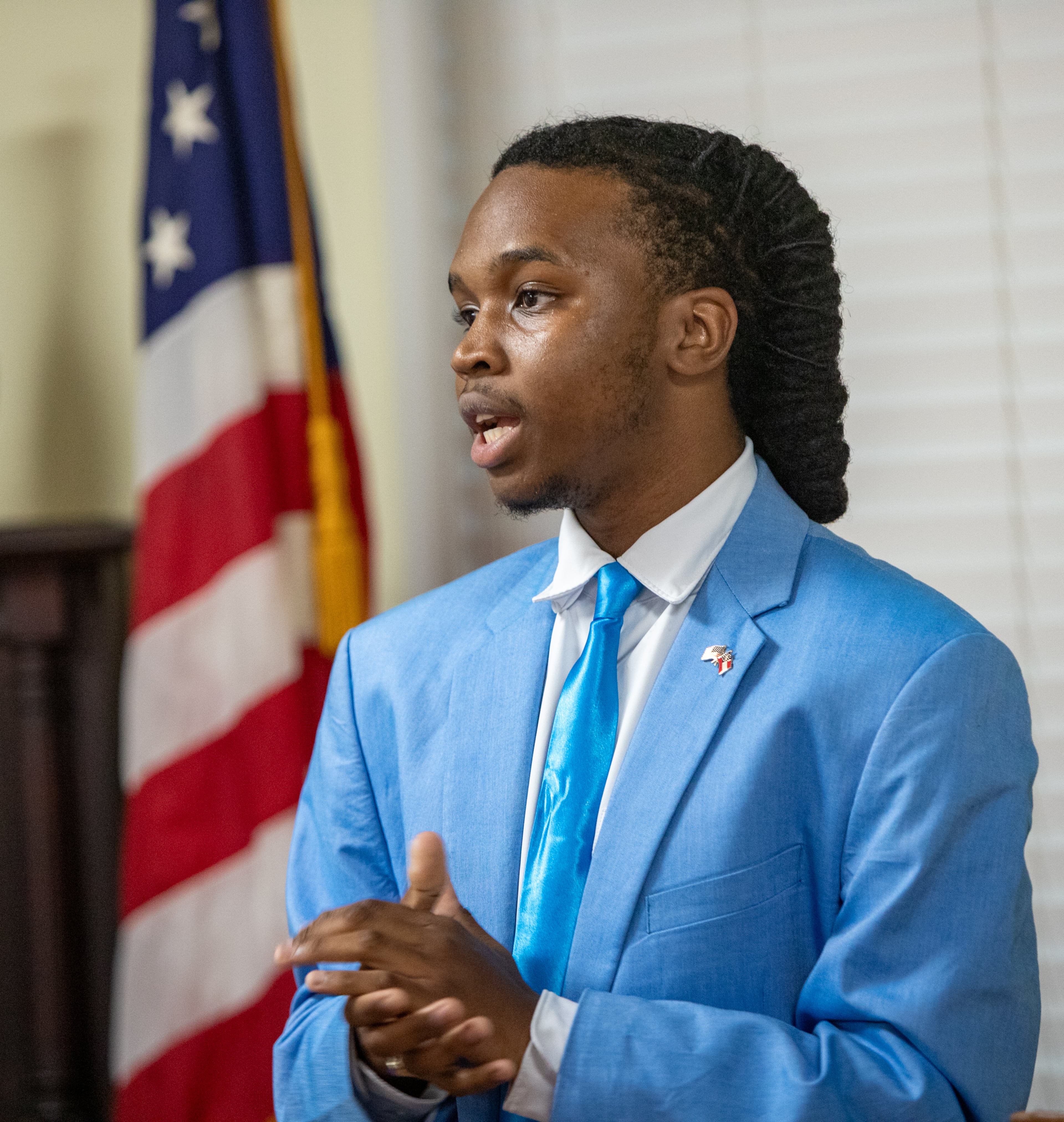 Ja'Quon Stembridge speaks during a Henry County Republican Party meeting on Tuesday, July 1, 2025. The 18-year-old political science major was elected assistant secretary of the State Executive Committee at the party’s state convention in June. (Jenni Girtman for the AJC)