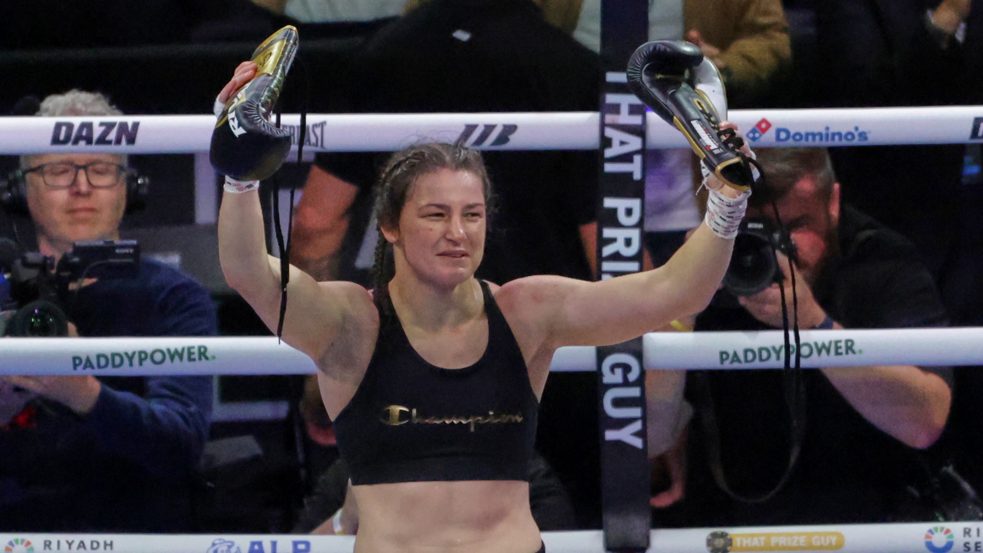 Ireland's Katie Taylor celebrates after beating Flora Pili of France in their super lightweight world title fight in Dublin, Saturday, Sept. 5, 2026. (AP Photo/Peter Morrison)