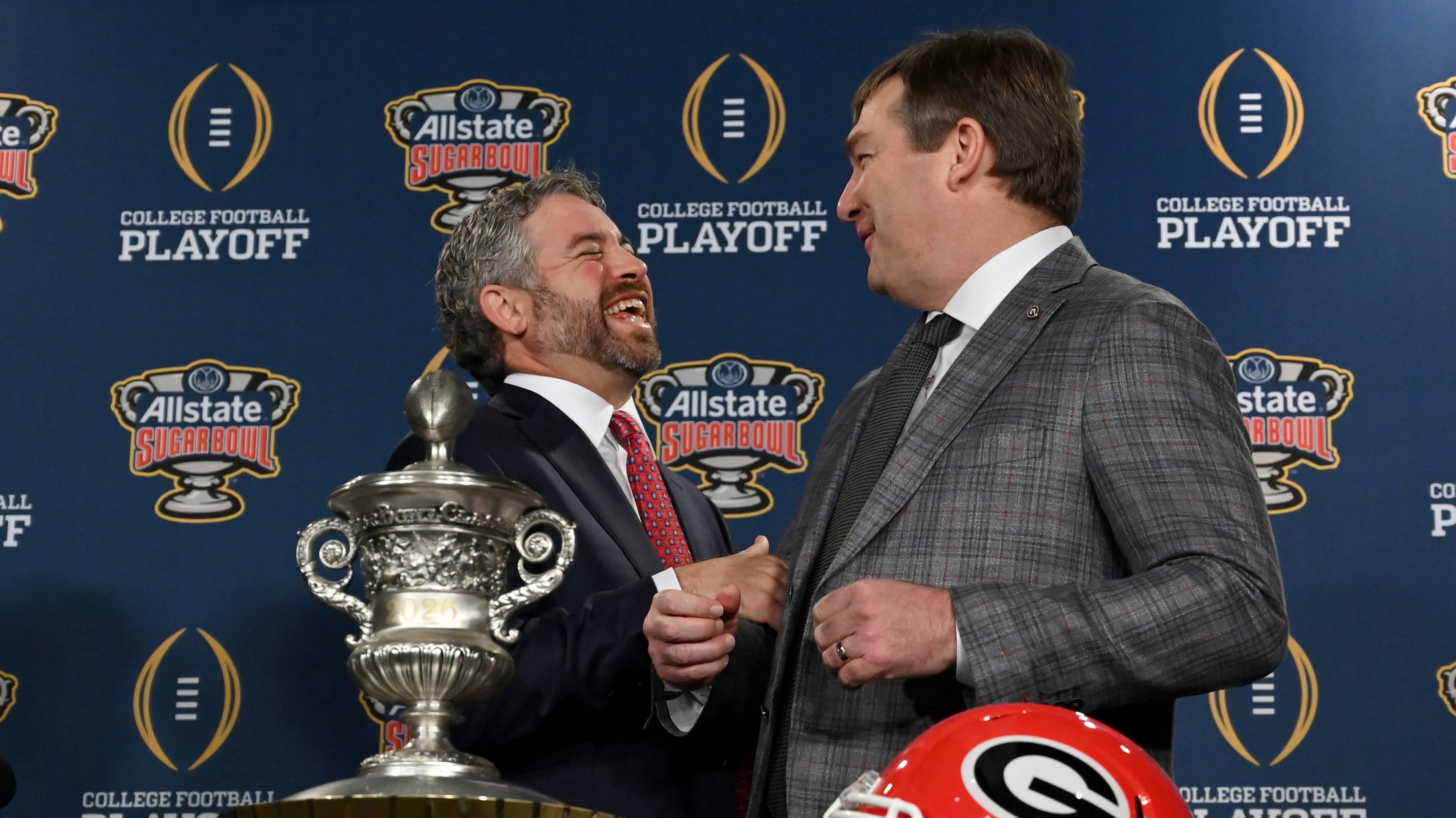 Georgia head coach Kirby Smart and Ole Miss head coach Pete Golding interact at a press conference ahead of the Sugar Bowl on Wednesday, Dec. 31, 2025, in New Orleans. (Hyosub Shin/AJC)