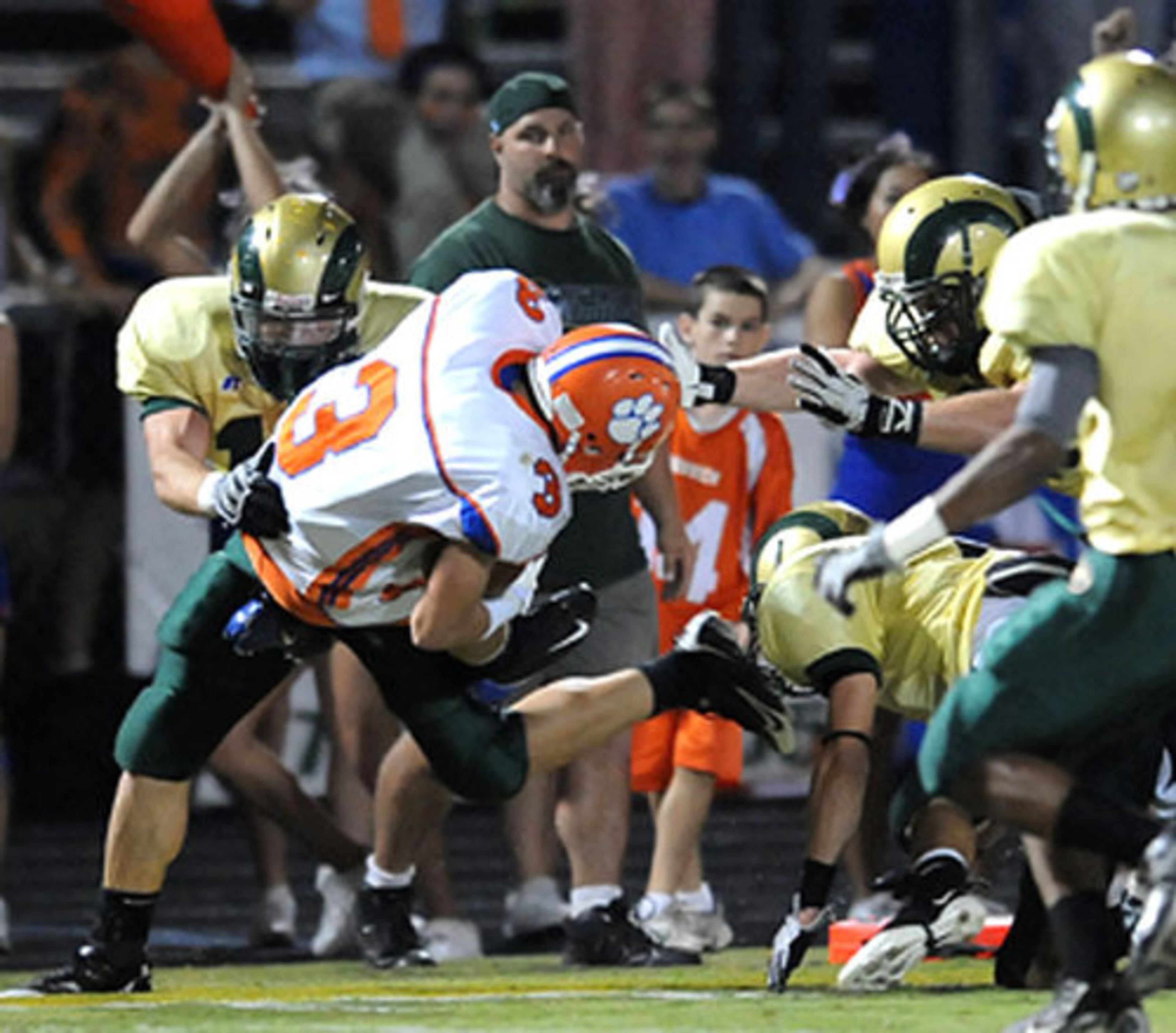 Parkview WR Buck McClure (#3) is wrapped up.