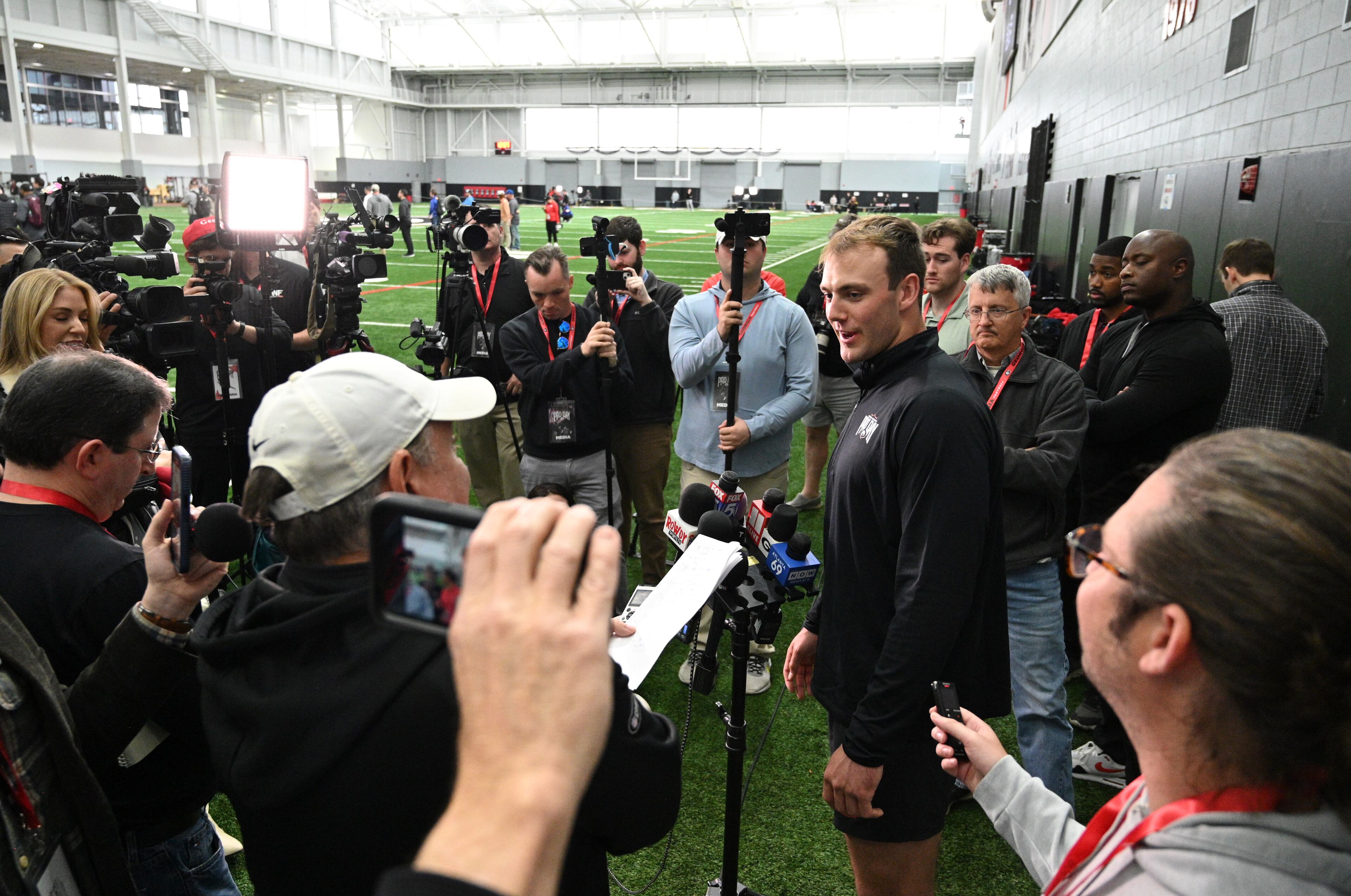 Georgia tight end Brock Bowers speaks to members of the media during Georgia Pro Day at Payne Indoor Athletic Facility, Wednesday, Mar. 13, 2024, in Athens. (Hyosub Shin / Hyosub.Shin@ajc.com)