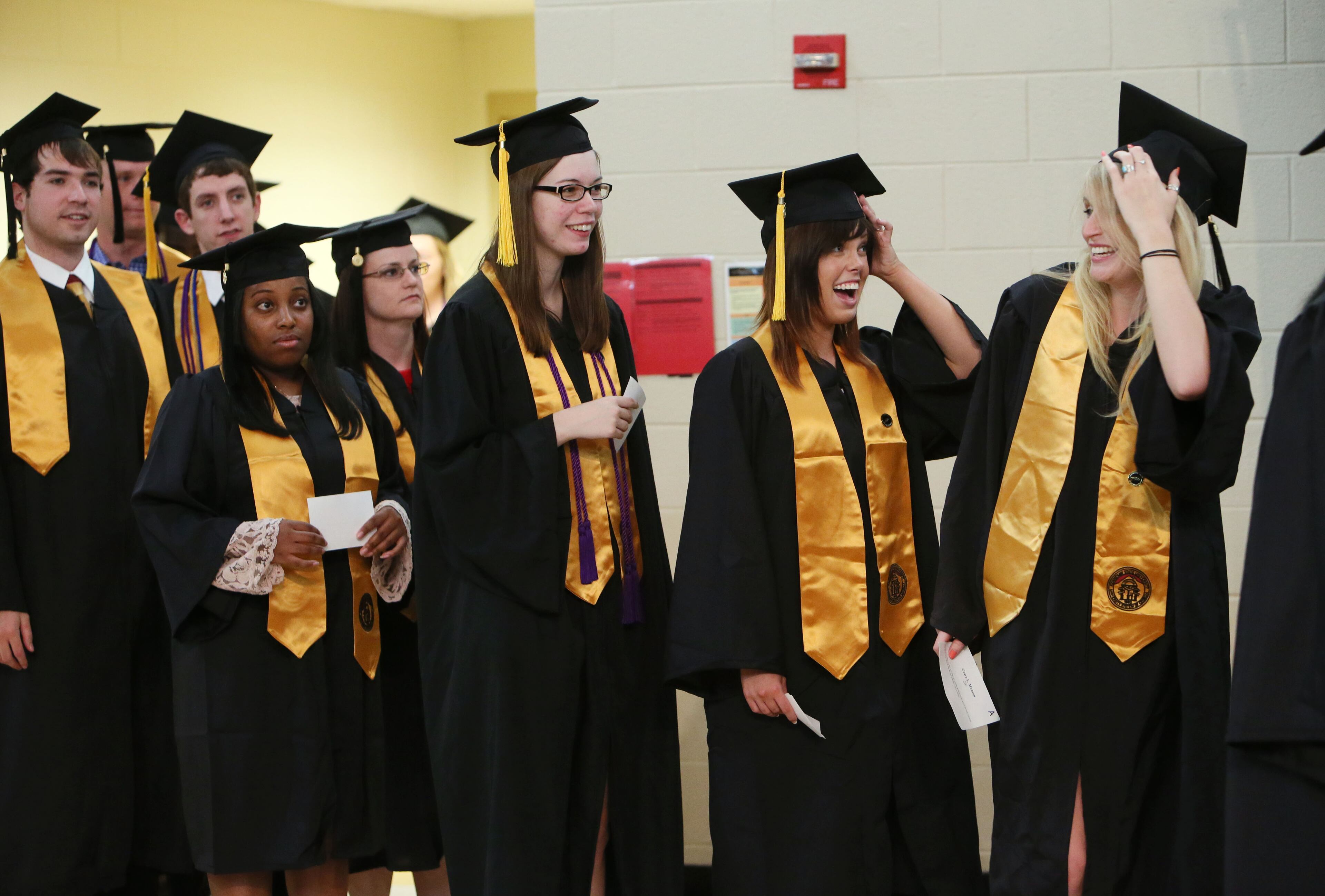 Graduates process in as the commencement ceremony for the Business/College of Science and Mathematics graduates gets underway.