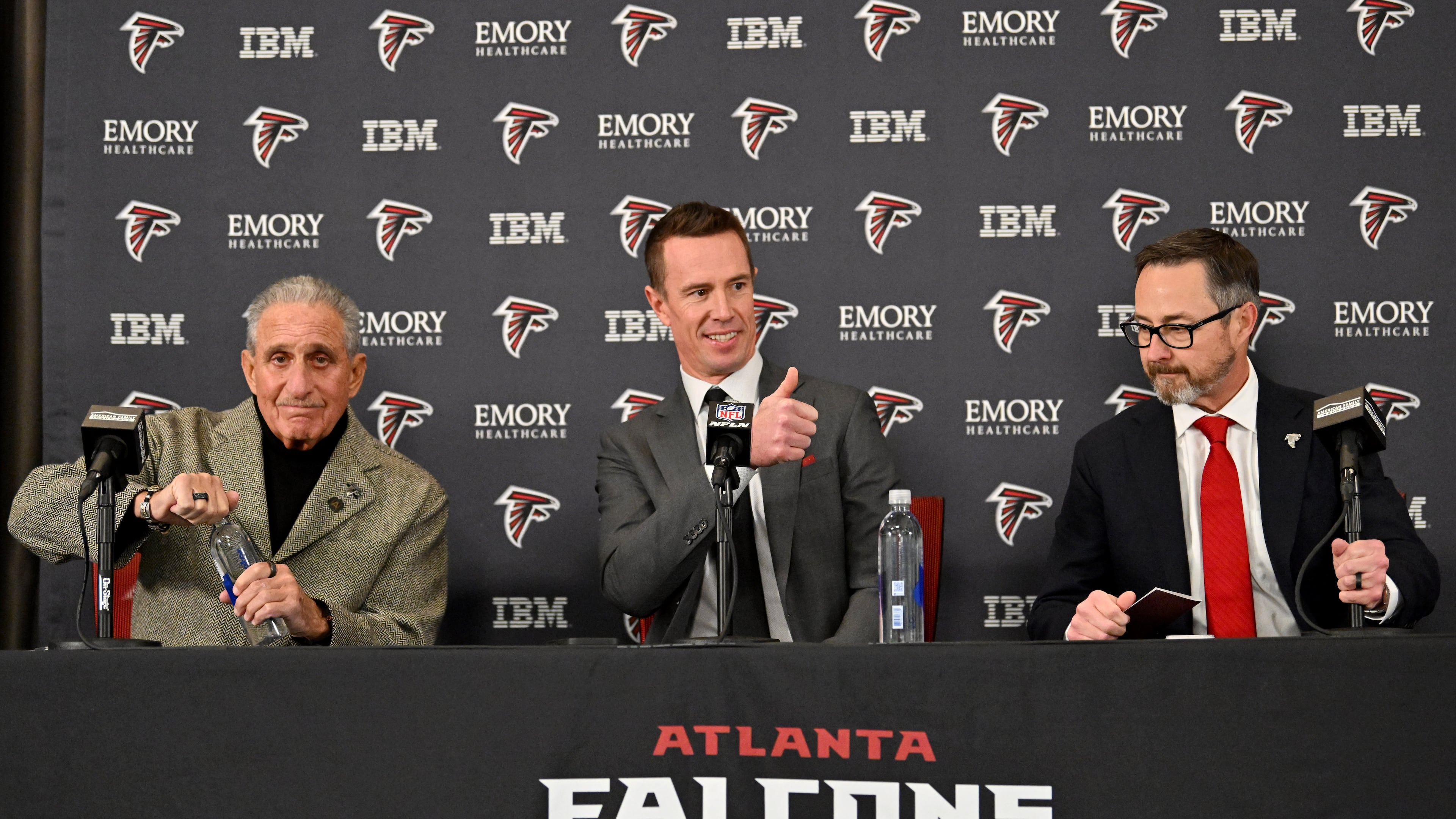 Falcons owner Arthur Blank (from left), president of football Matt Ryan and CEO Greg Beadles attend a news conference to introduce Ryan in his new role on Tuesday, Jan. 13, 2026, in Flowery Branch. (Hyosub Shin/AJC)