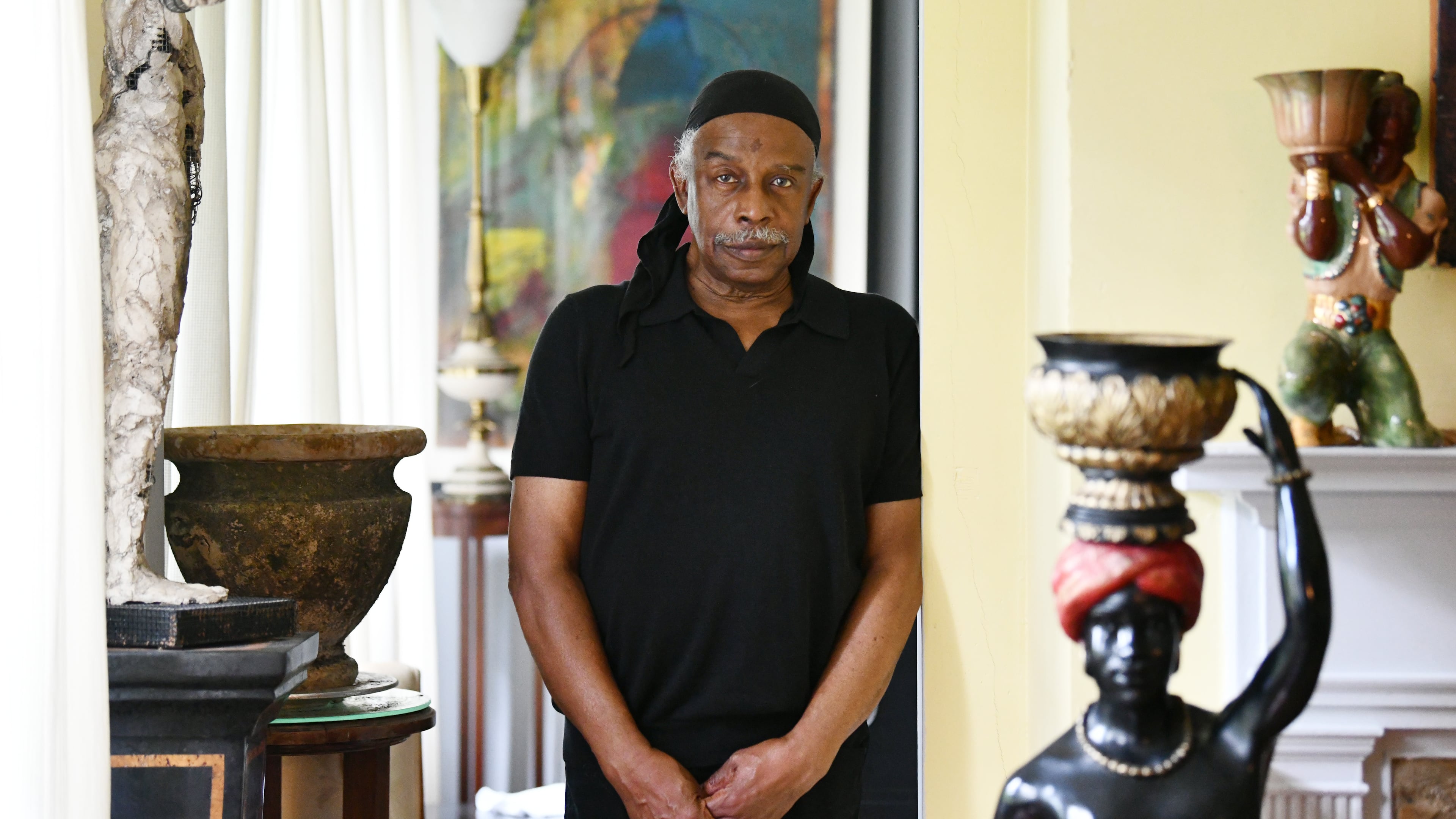 Abstract artist Freddie Styles, whose home and artwork was destroyed by fire in February, is staying at the home of his longtime friend and fellow artist Carl Christian. (Hyosub Shin/AJC)