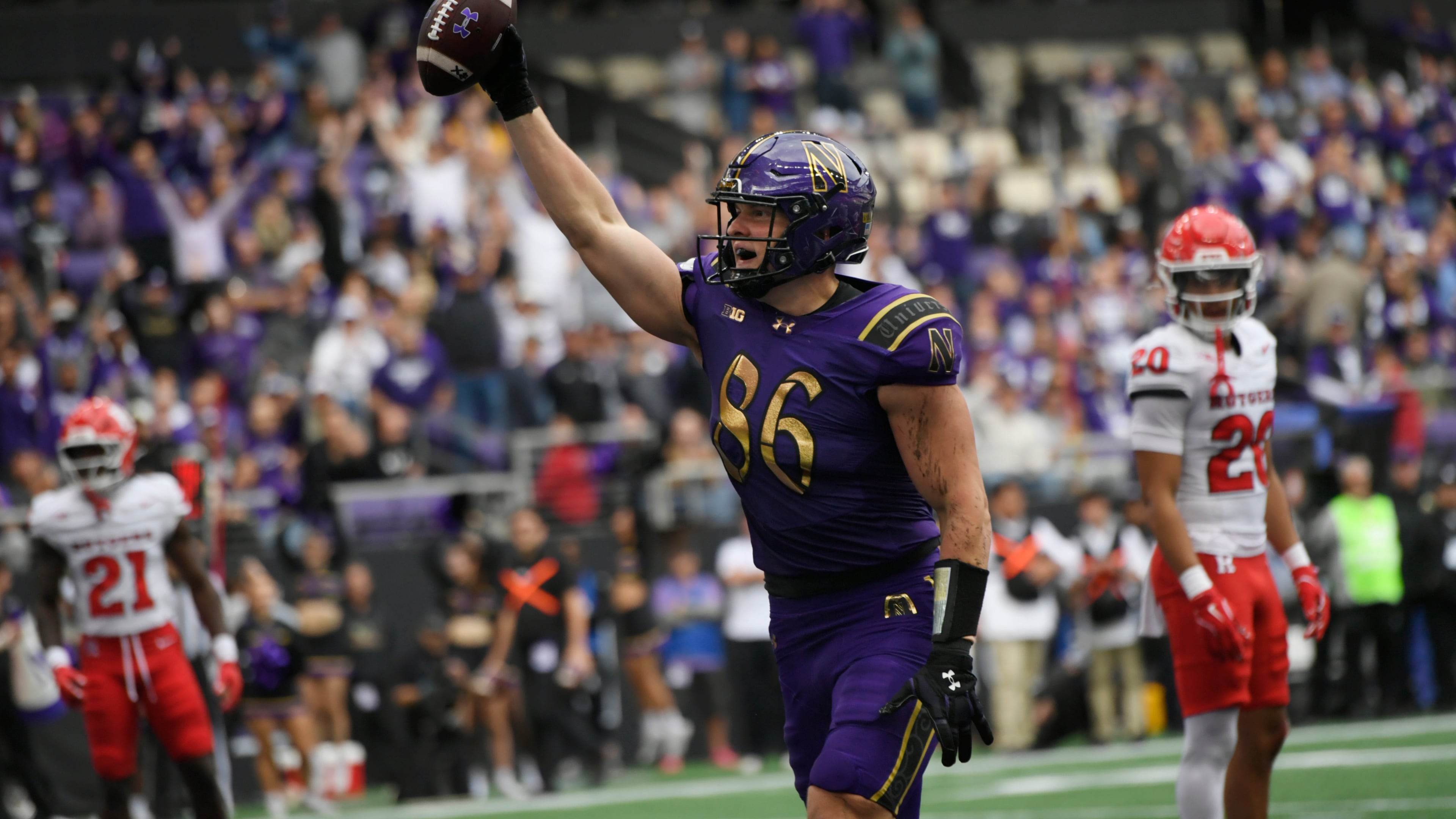 Northwestern tight end Alex Honig (86) celebrates after catching a touchdown pass during the first half of an NCAA college football game against Rutgers, Saturday, Oct. 24, 2026, in Evanston, Ill. (AP Photo/Paul Beaty)