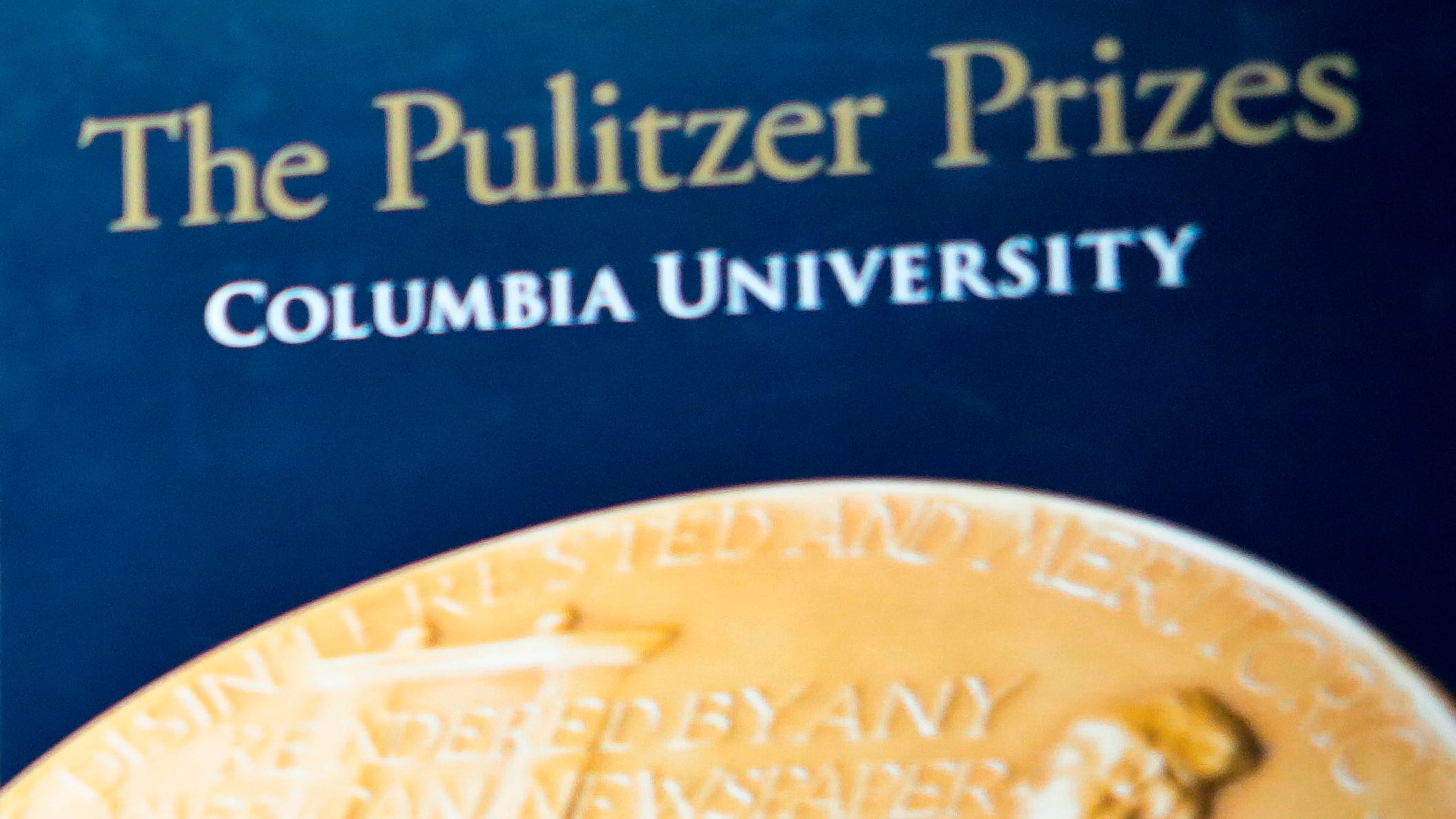 FILE - Signage for The Pulitzer Prizes appear at Columbia University, May 28, 2019, in New York. (AP Photo/Bebeto Matthews, File)