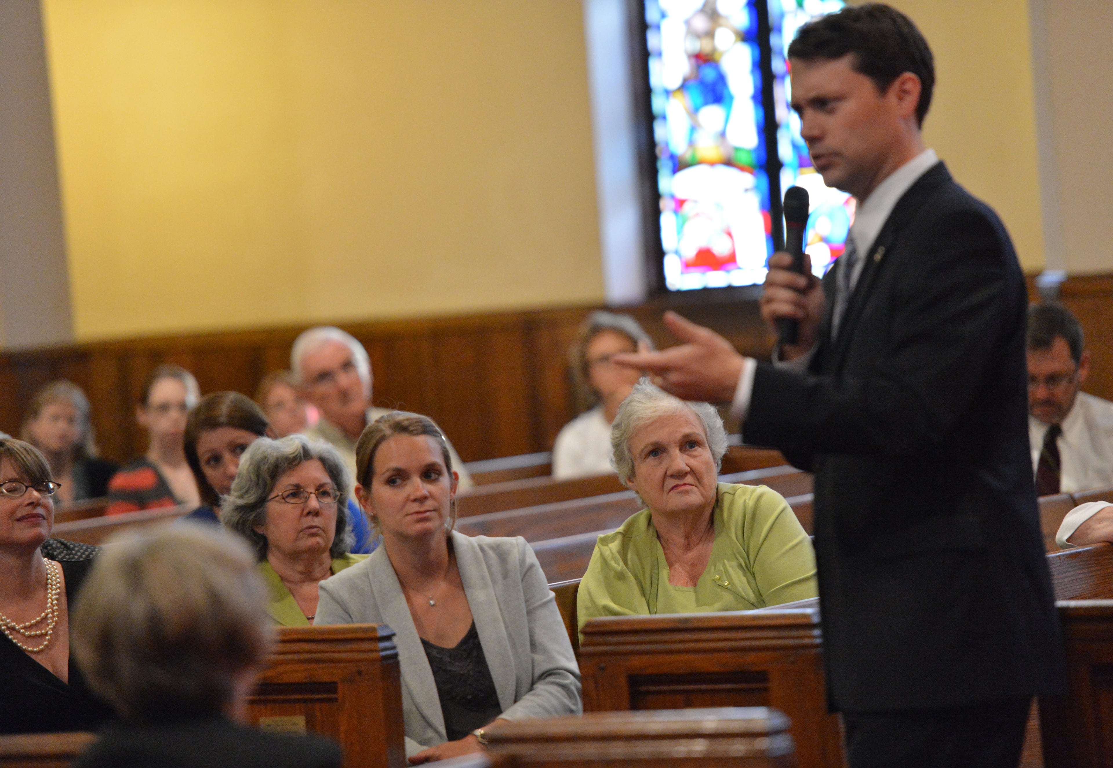 Audience members listen to Georgia state Sen. Jason Carter during Georgia Public Education Forum at Druid Hills Presbyterian Church in Atlanta on Sept. 19, 2012.