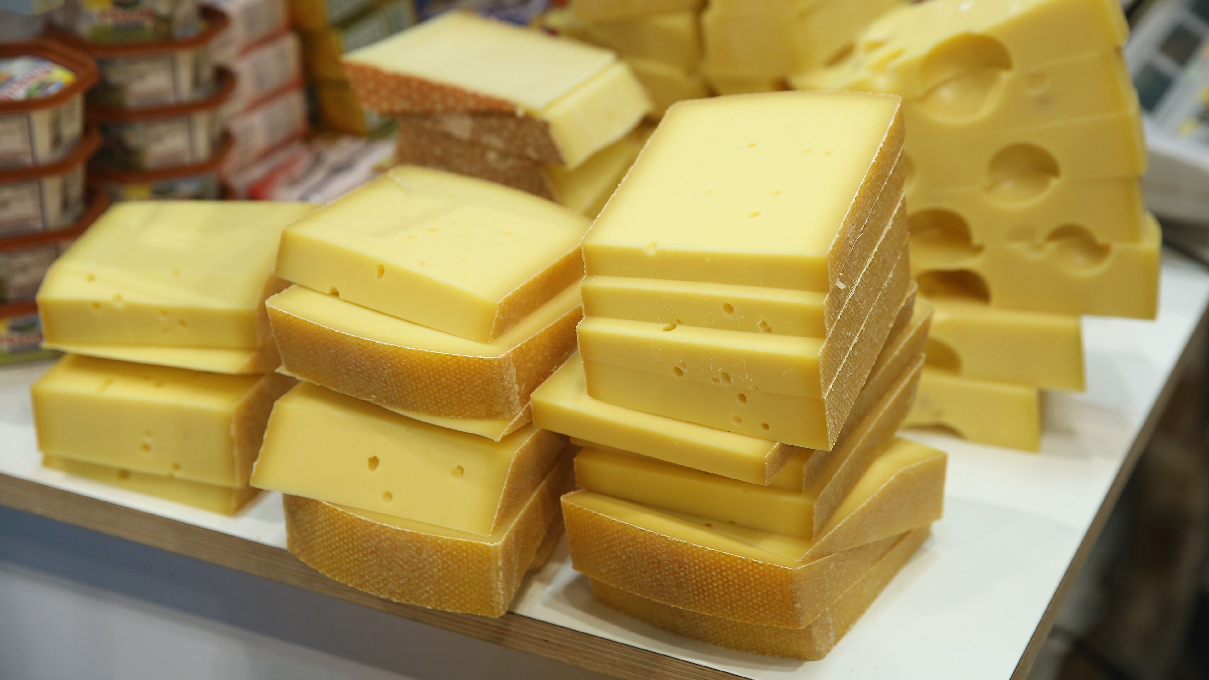 BERLIN, GERMANY - JANUARY 16: Alpine mountain cheese awaits visitors at a stand at the International Green Week agricultural trade fair (Internationale Gruene Woche) on January 16, 2015 in Berlin, Germany. The International Green Week is the world's largest agricultural trade fair and is open to the public from January 16-25. (Photo by Sean Gallup/Getty Images)