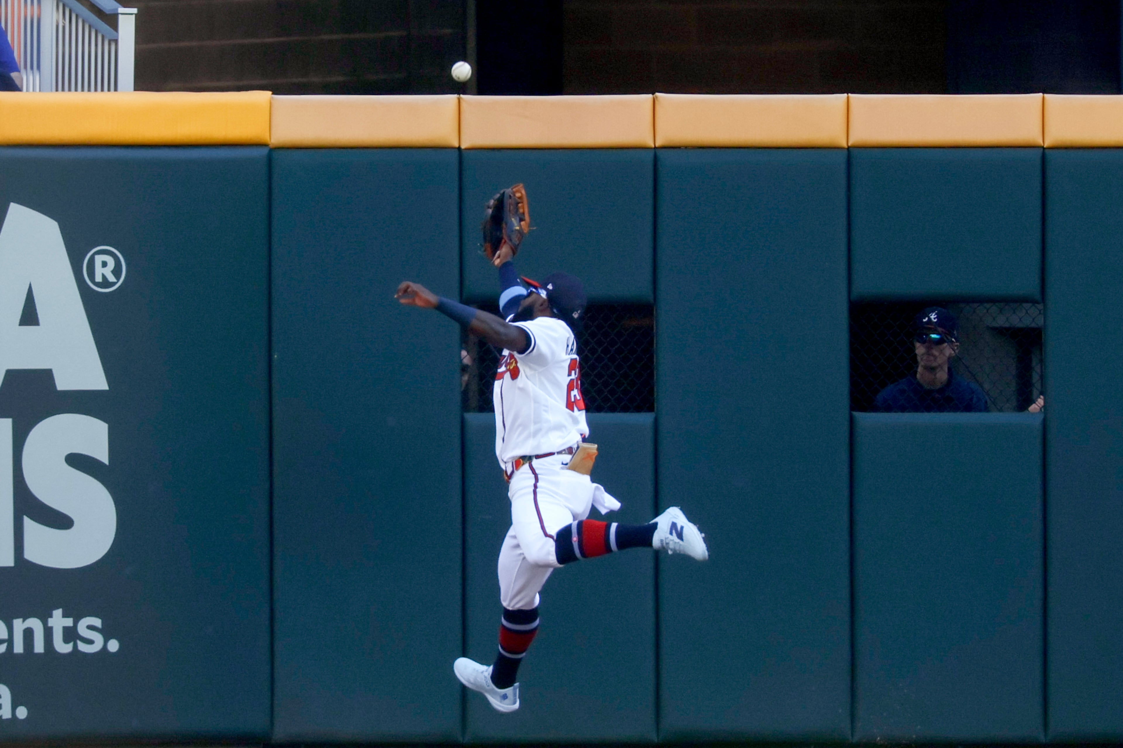 Atlanta Braves center fielder Michael Harris II misses catching an RBI double hit by Philadelphia Phillies' Alec Bohm during the first inning of Game 1 of a MLB National League Wild Card playoff series between the Atlanta Braves and the Philadelphia Phillies, Tuesday, Sept. 29, 2026, in Atlanta. (Miguel Martinez/AJC)