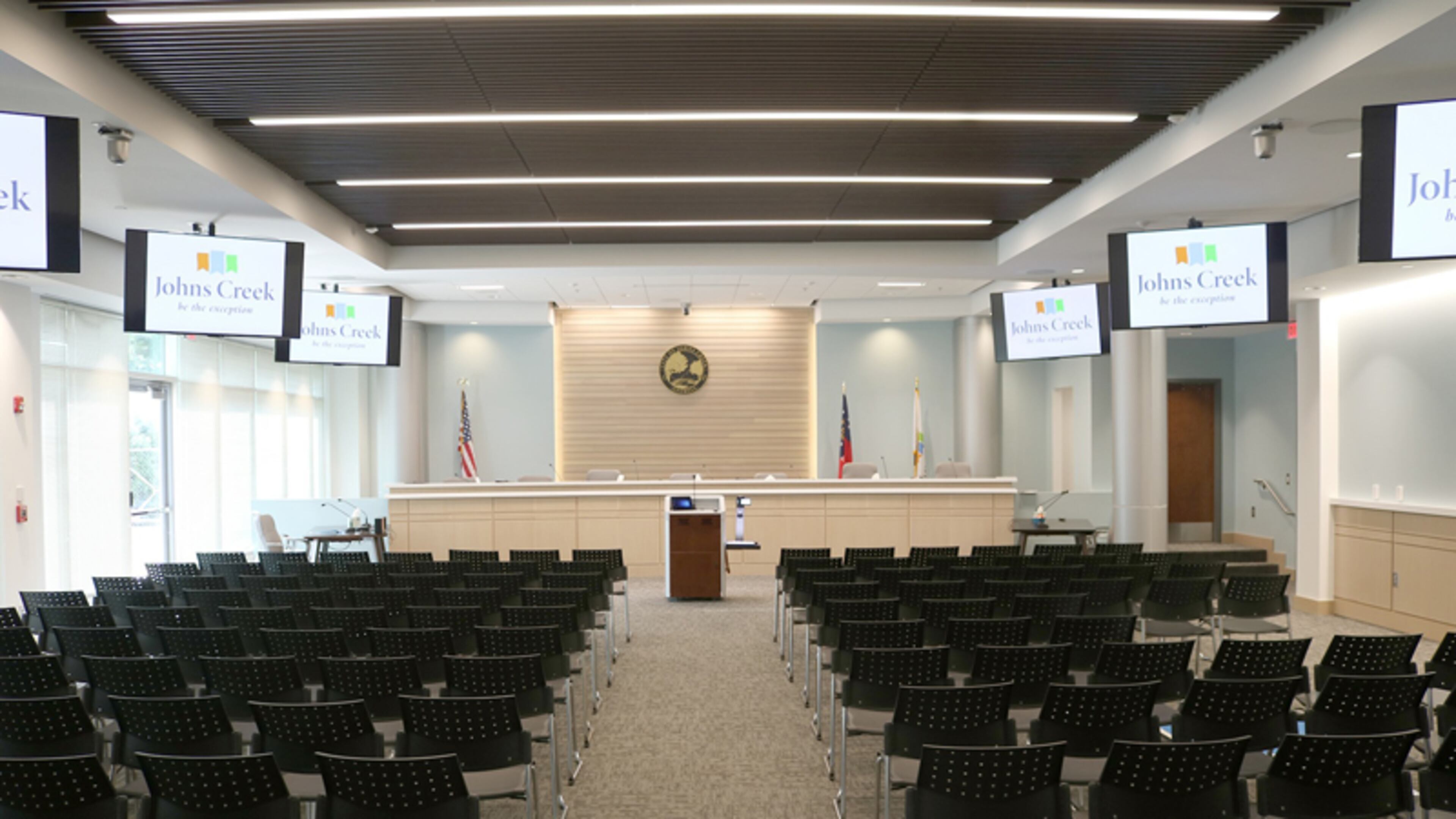 The Johns Creek City Council chambers will be the venue for three public hearings in August on a tentative millage rate that would result in a 13.3% property tax increase.
