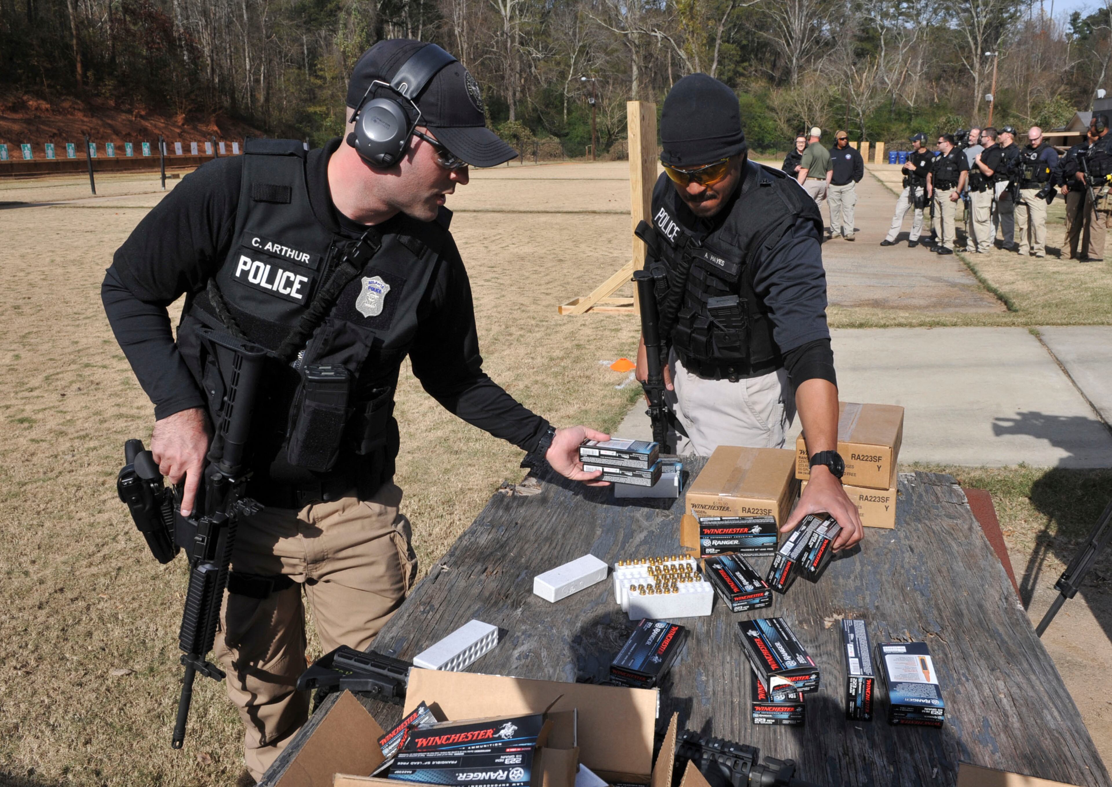NOVEMBER 24, 2015 ATLANTA APD Officers C. Arthur and A. Hayes reload as they participate in the training. KENT D. JOHNSON/ kdjohnson@ajc.com