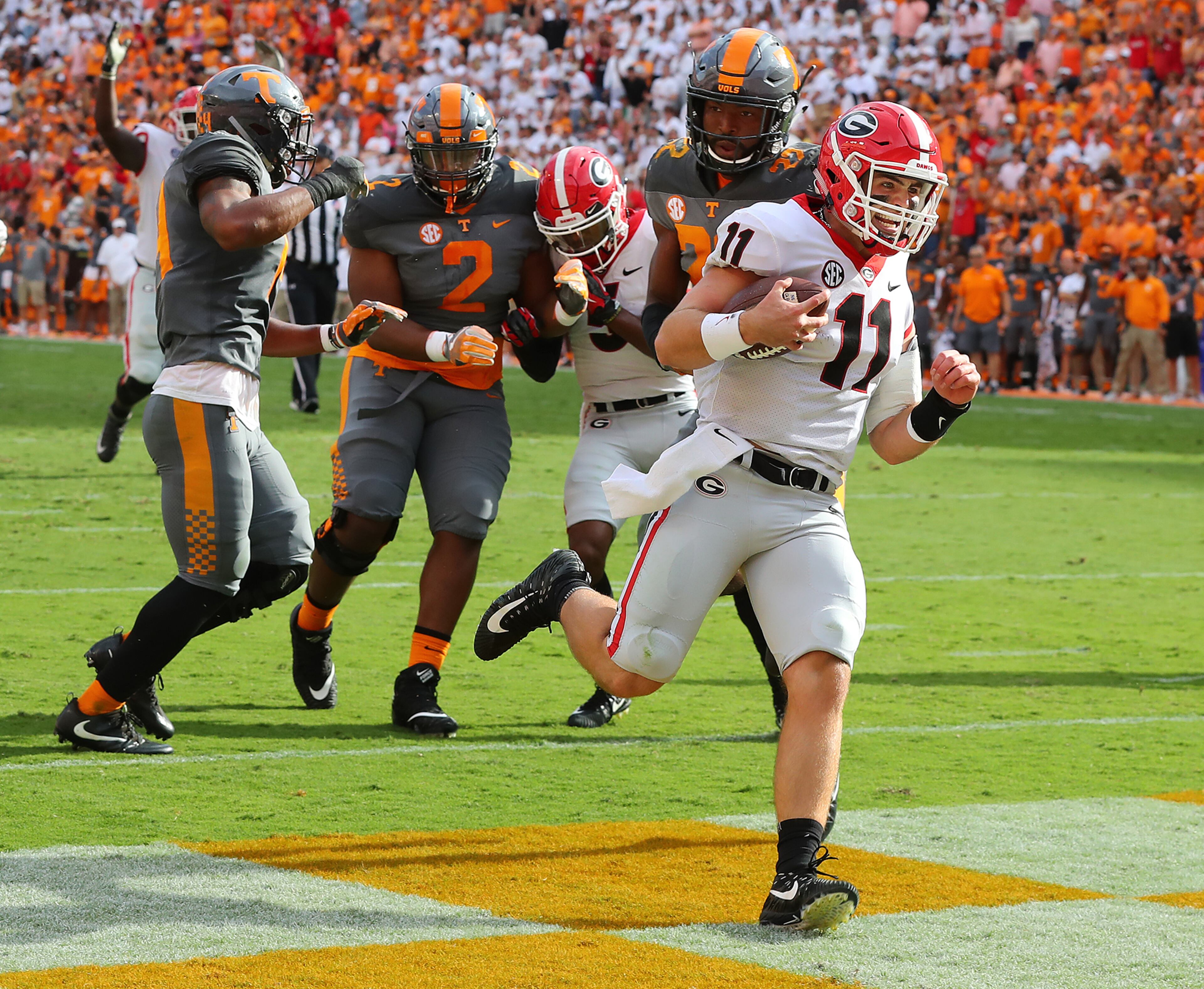 September 30, 2017 Knoxville: Georgia quarterback Jake Fromm hits the endzone on a quarterback keeper for his first of two touchdown runs against Tennessee during the second quarter for a 17-0 lead in a NCAA college football game on Saturday, September 30, 2017, in Knoxville. Curtis Compton/ccompton@ajc.com