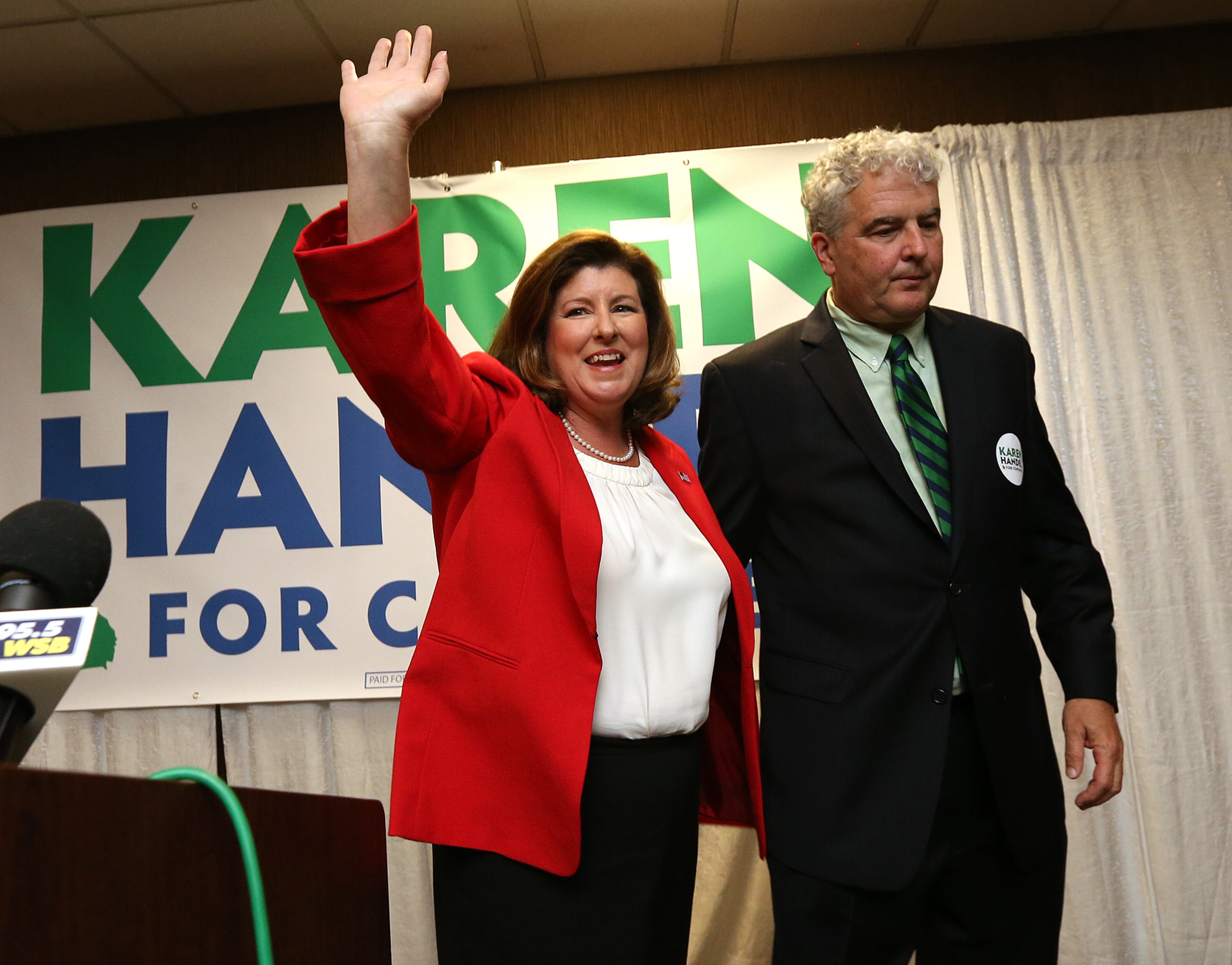 April 18, 2017, Roswell: Republican candidate Karen Handel thanks her supporters and her husband Steve Handel at the conclusion of her election night viewing party in the special election for Georgia's 6th Congressional district at the DoubleTree Hotel on Tuesday, April 18, 2017, in Roswell. Curtis Compton/ccompton@ajc.com