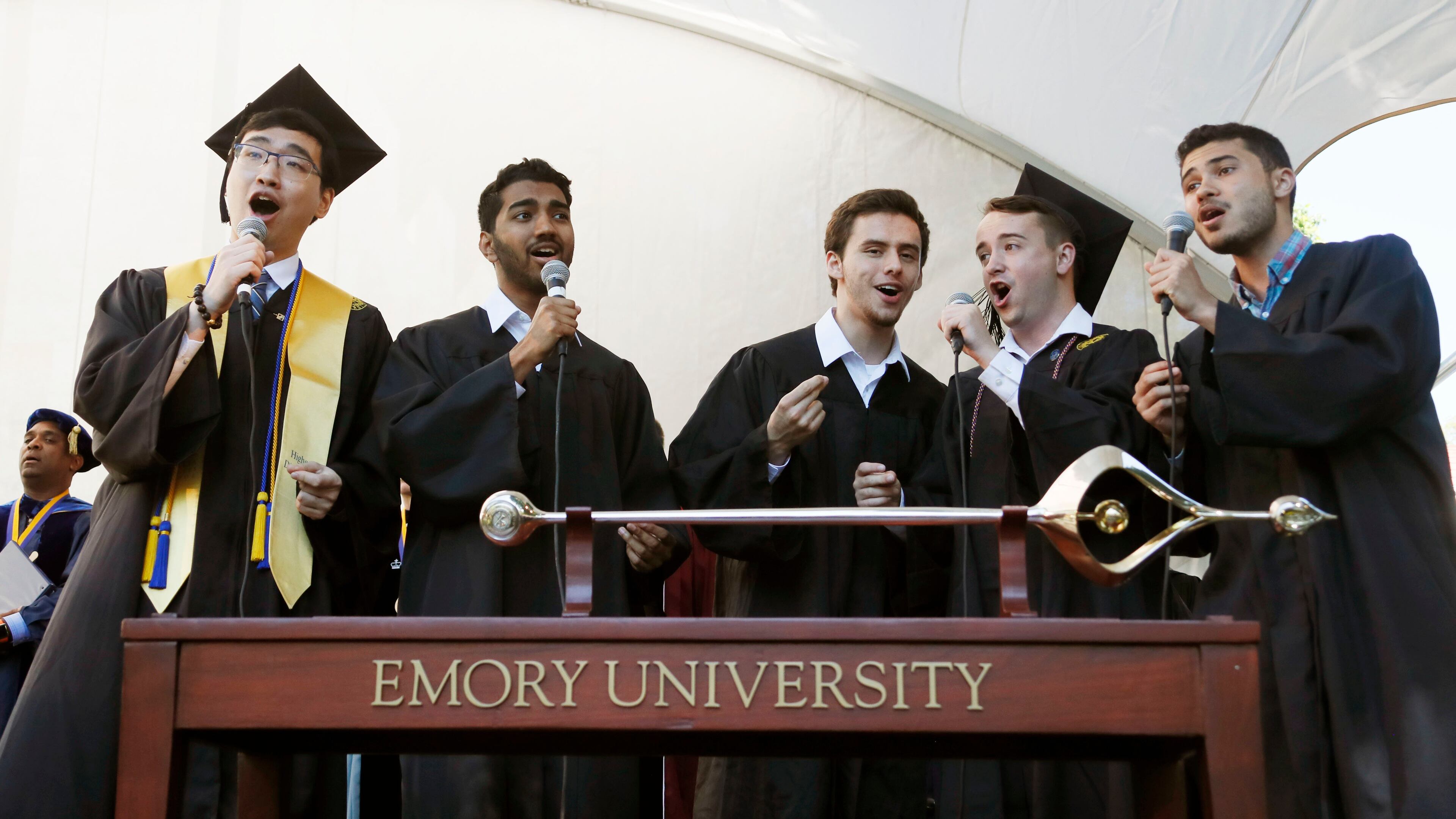 Emory students sing the Alma Mater to close the ceremony. Claire E. Sterk, the university's 20th president, presided over the 174th commencement exercises on Monday, May 13, 2019. Andrew Young, former Atlanta mayor and civil rights activist, delivered the keynote address. Bob Andres / bandres@ajc.com