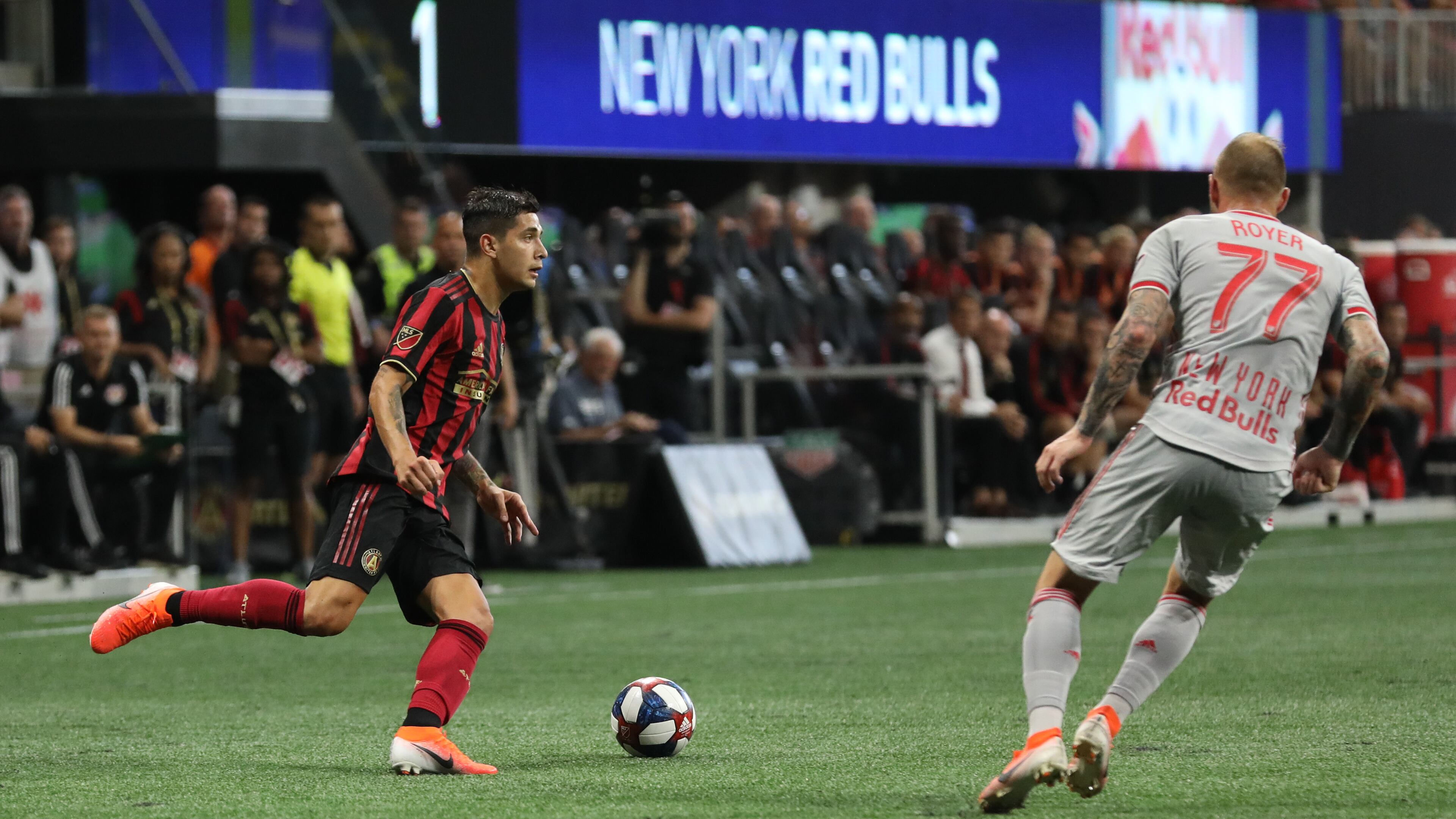 Atlanta United defender Franco Escobar (2) looks to pass while being defended by New York Red Bulls midfielder Daniel Royer (77) during the first half in a MLS game on Sunday, July 7, 2019, in Atlanta. Branden Camp/SPECIAL
