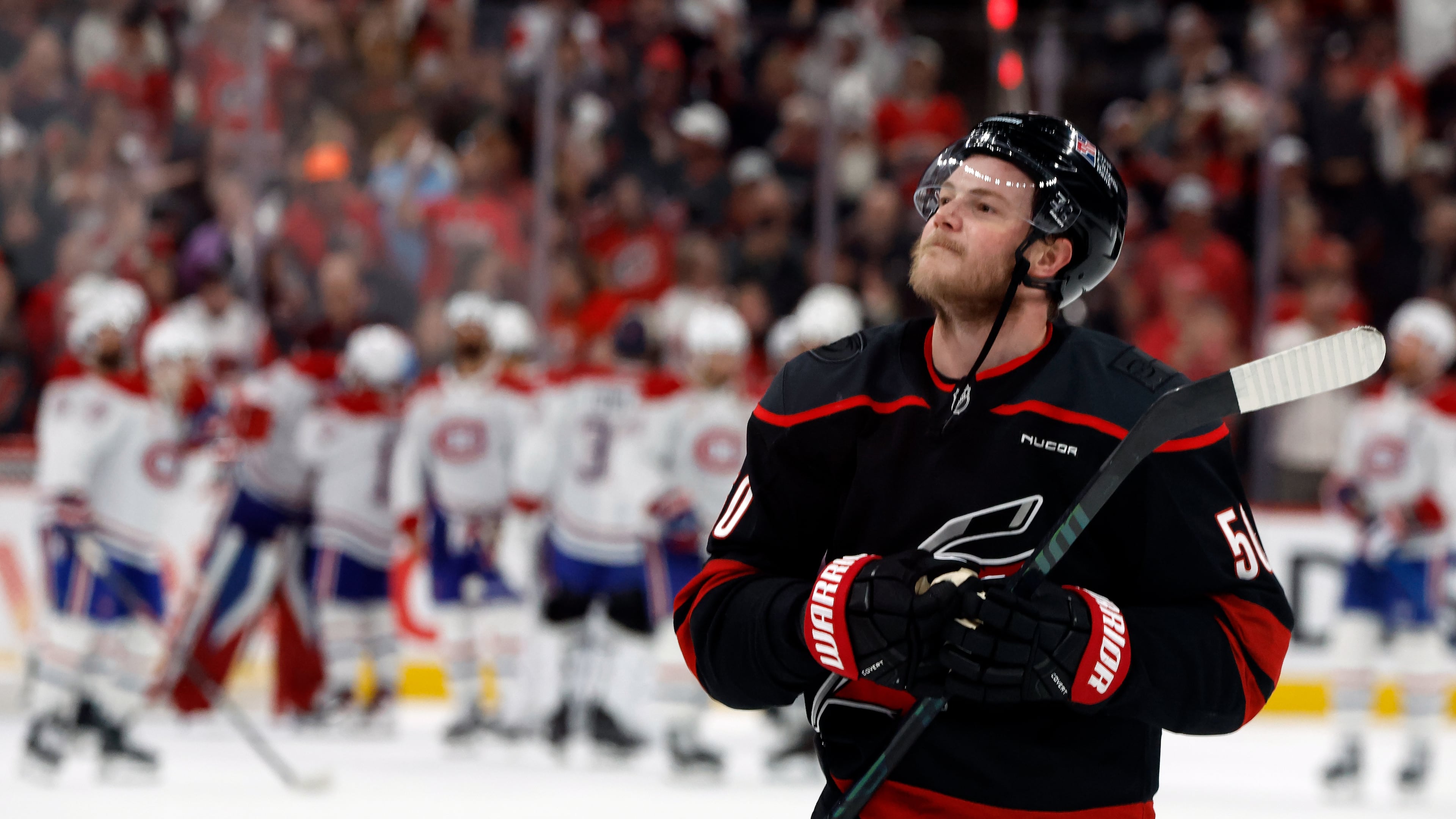 Carolina Hurricanes' Eric Robinson celebrates following Game 5 of the Eastern Conference finals NHL hockey Stanley Cup playoff series against the Montreal Canadiens in Raleigh, N.C., Friday, May 29, 2026. (AP Photo/Karl DeBlaker)
