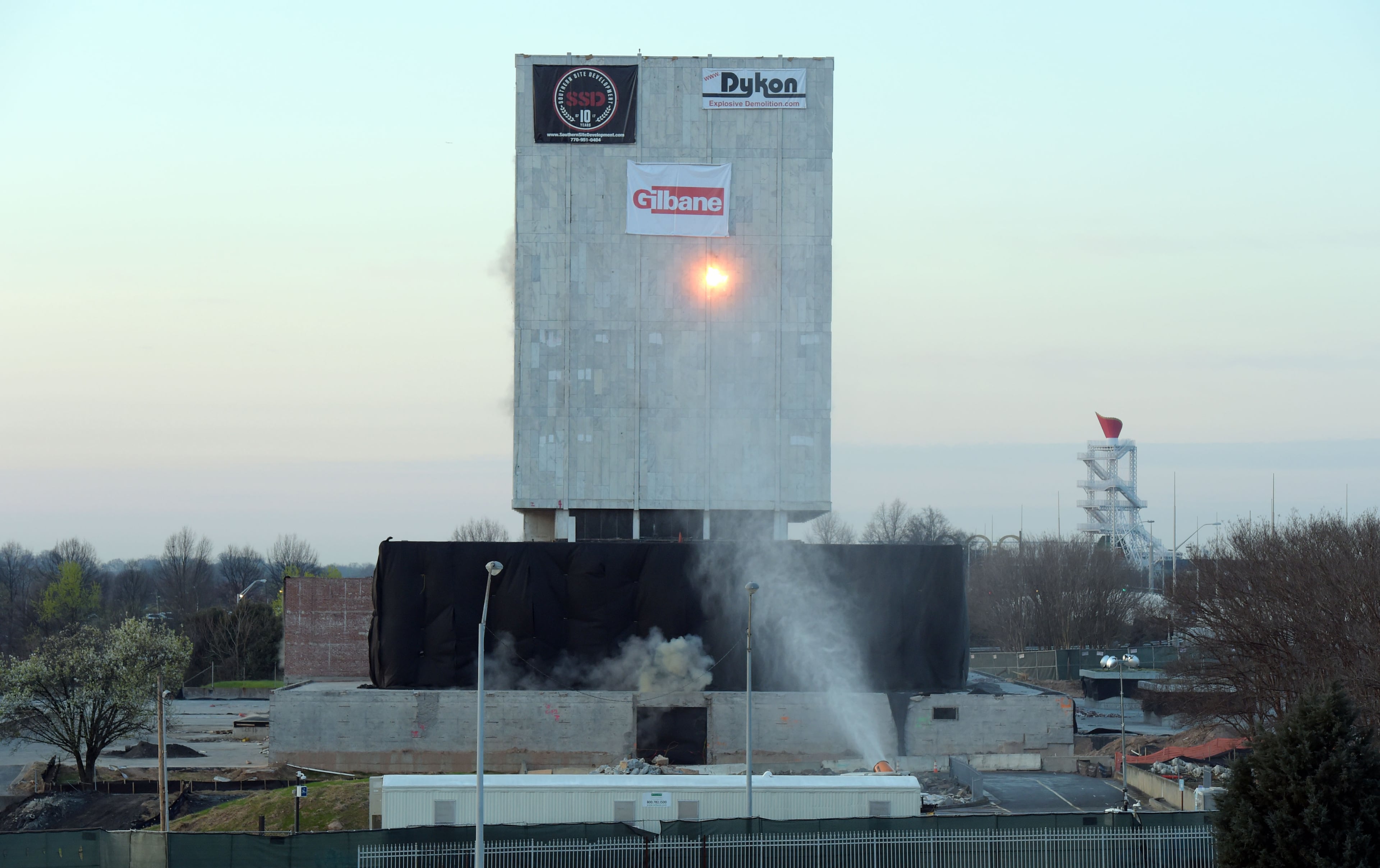 MARCH 5, 2017 7:04:57 AM ATLANTA Explosives go off in the structure as demolition crews bring down the old state archives building in a controlled implosion shortly after 7 am Sunday, March 5, 2017. The 14 story state archives building was about 50 years old and was imploded to make way for a new state courts building. Gov. Deal has budgeted about $105 million in next year's budget for the new state courts building. Kent D. Johnson/AJC