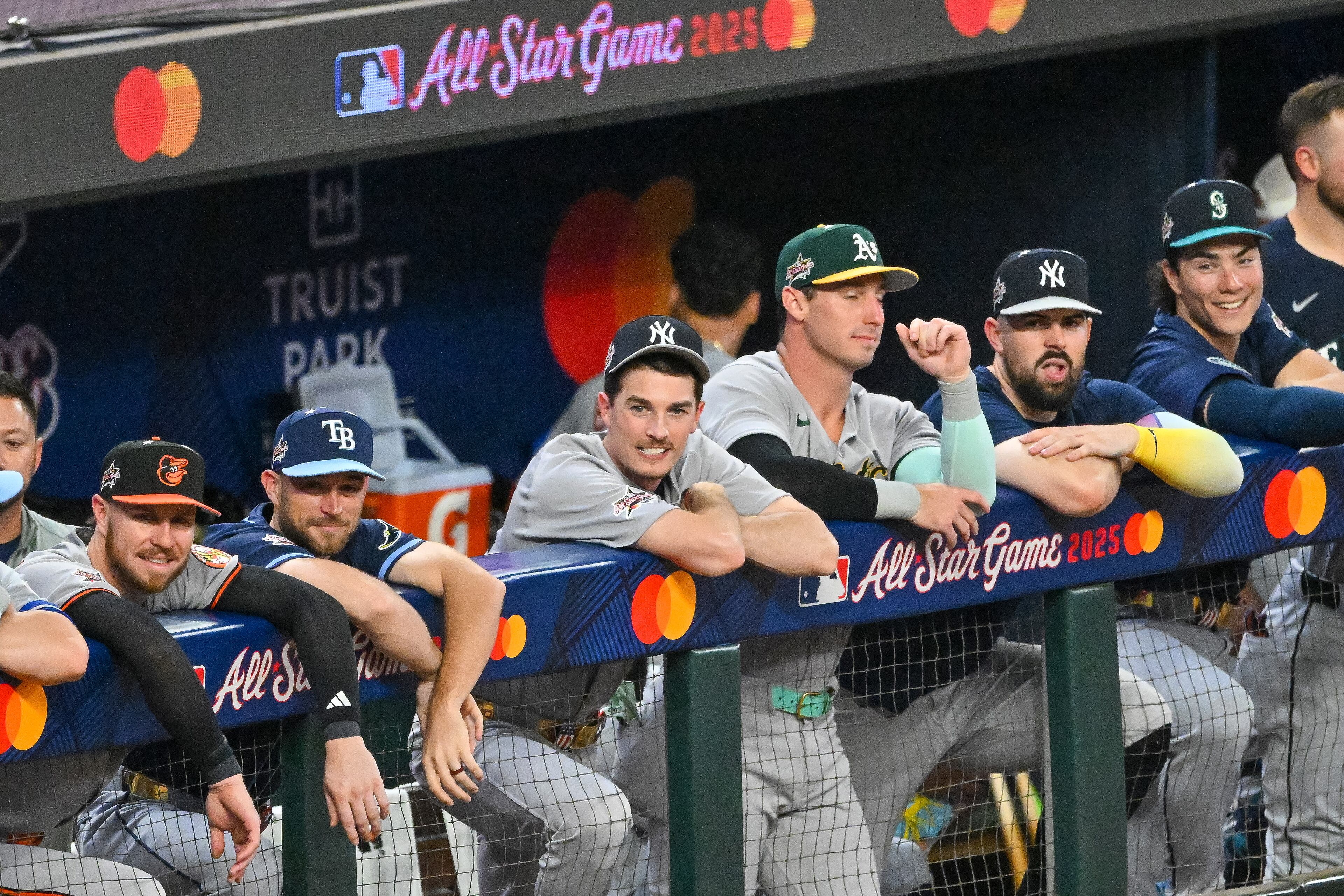 The American League's Max Fried of the New York Yankees (center) and formerly the Atlanta Braves, watches from the dugout during the MLB All-Star Game at Truist Park in Atlanta on Tuesday, July 15, 2025. (Hyosub Shin/AJC)