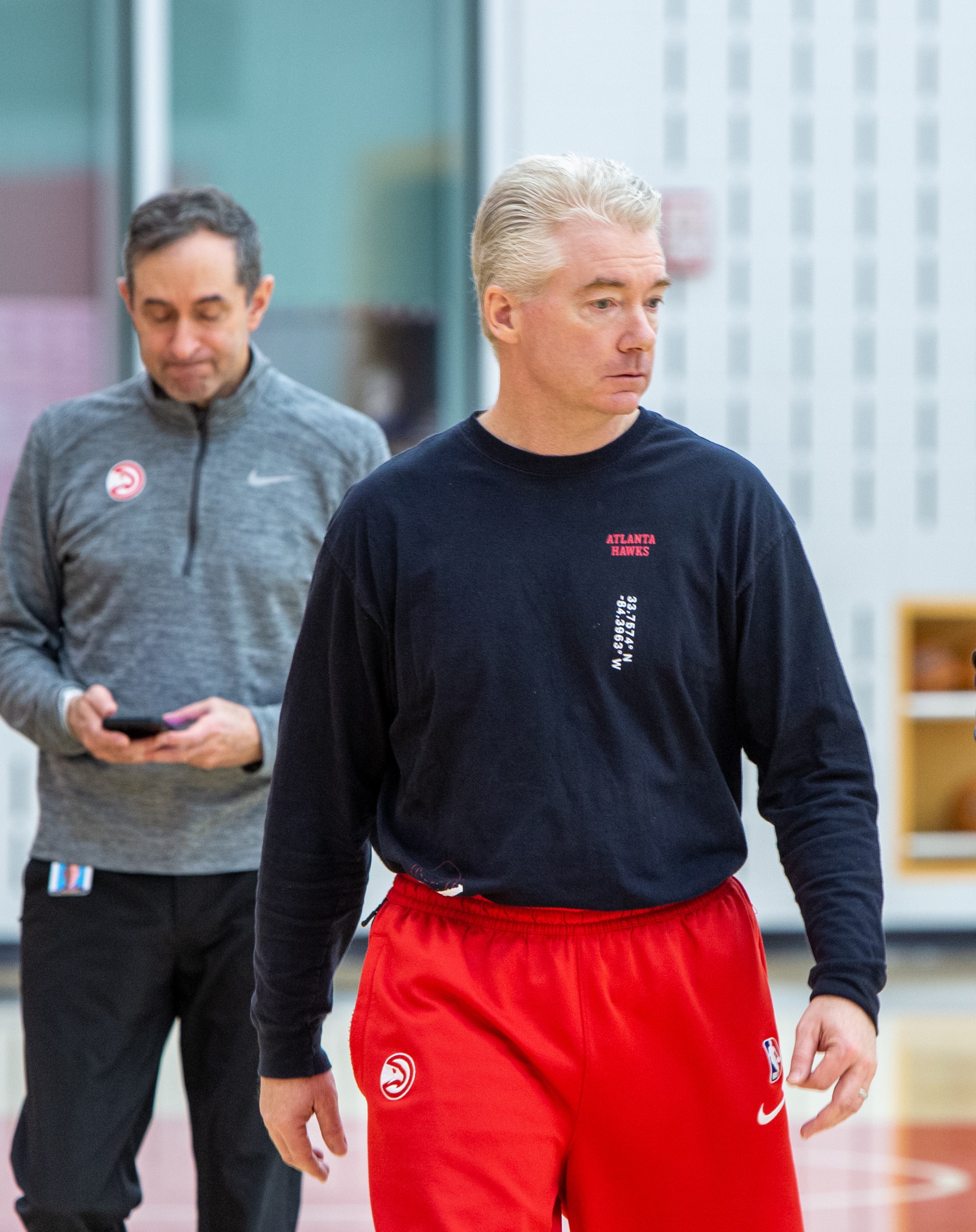 Interim coach Joe Prunty prepares to meet the media Wednesday at the Hawks' practice facility. (Jenni Girtman/For the AJC)