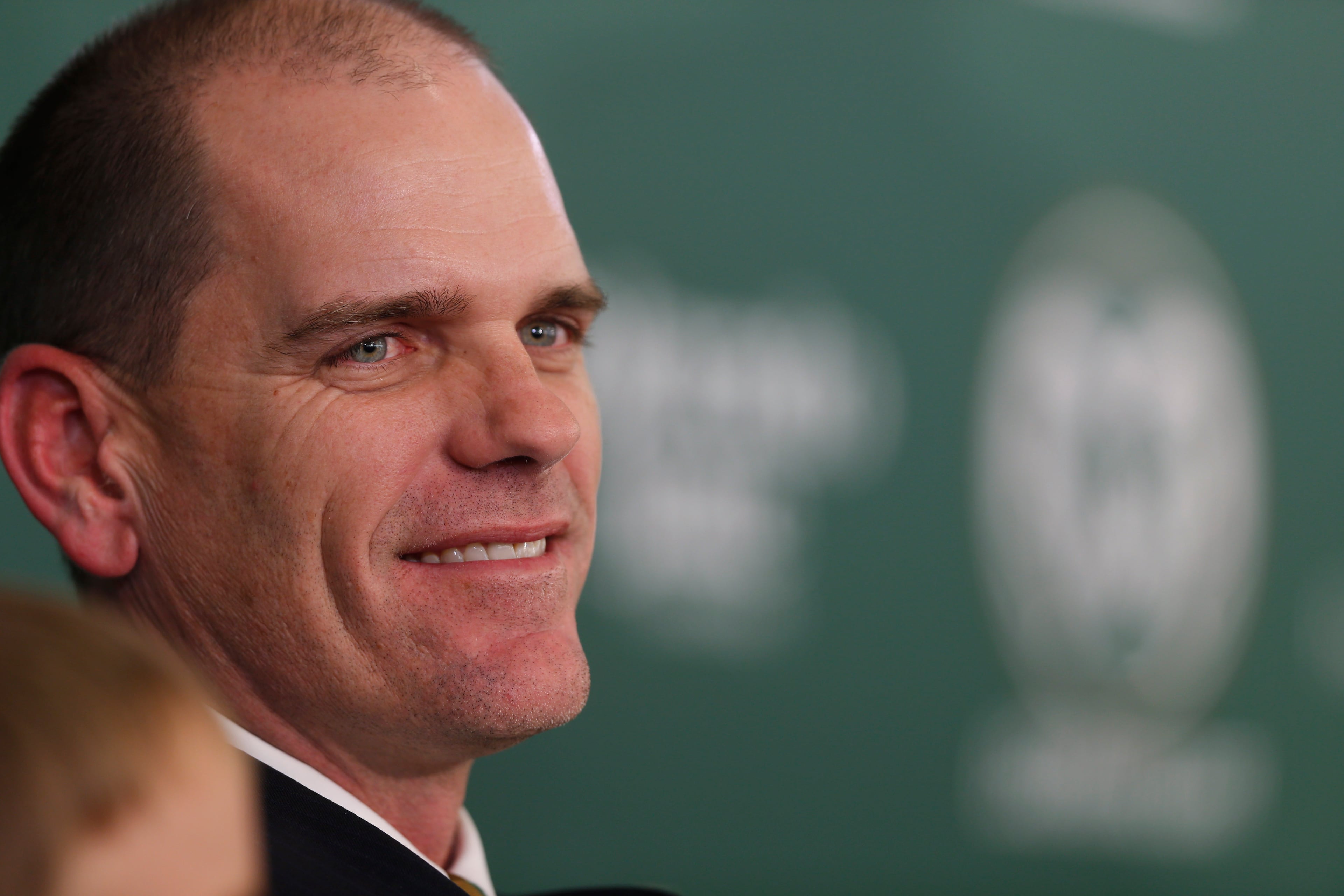 Mike Bobo smiles during his introduction as the new head football coach at Colorado State at a news conference Tuesday, Dec. 23, 2014, in Fort Collins, Colo. Bobo, who was the offensive coordinator at the University of Georgia, succeeds Jim McElwain, who left after three seasons to become the head football coach at the University of Florida. (AP Photo/David Zalubowski)