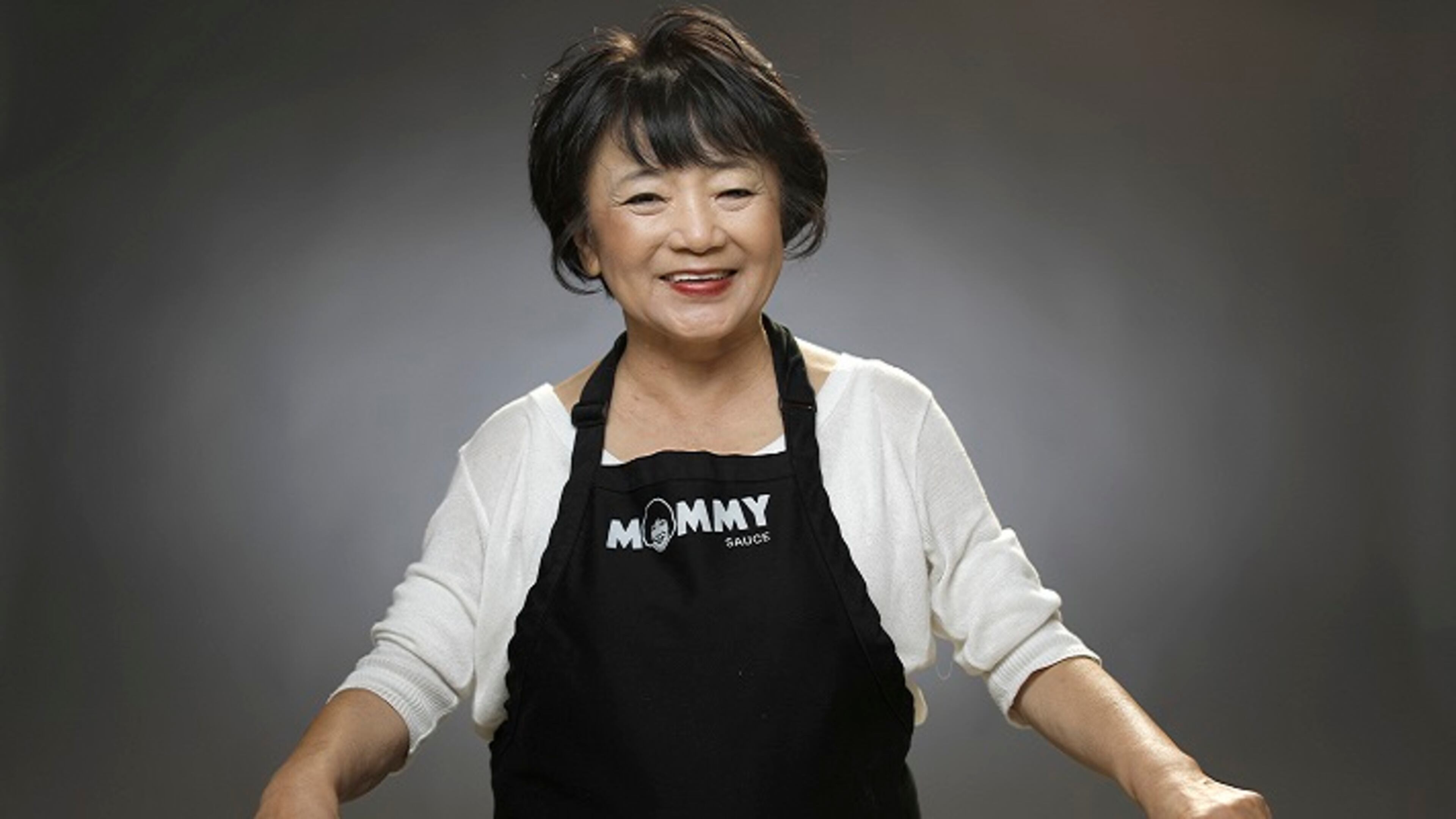 Jai Nam "Mommy Choi" Choi, makes a traditional spicy Korean rice cake dish -- dduk-bok-gi -- usually made during the holidays. (Myung J. Chun/Los Angeles Times/TNS)