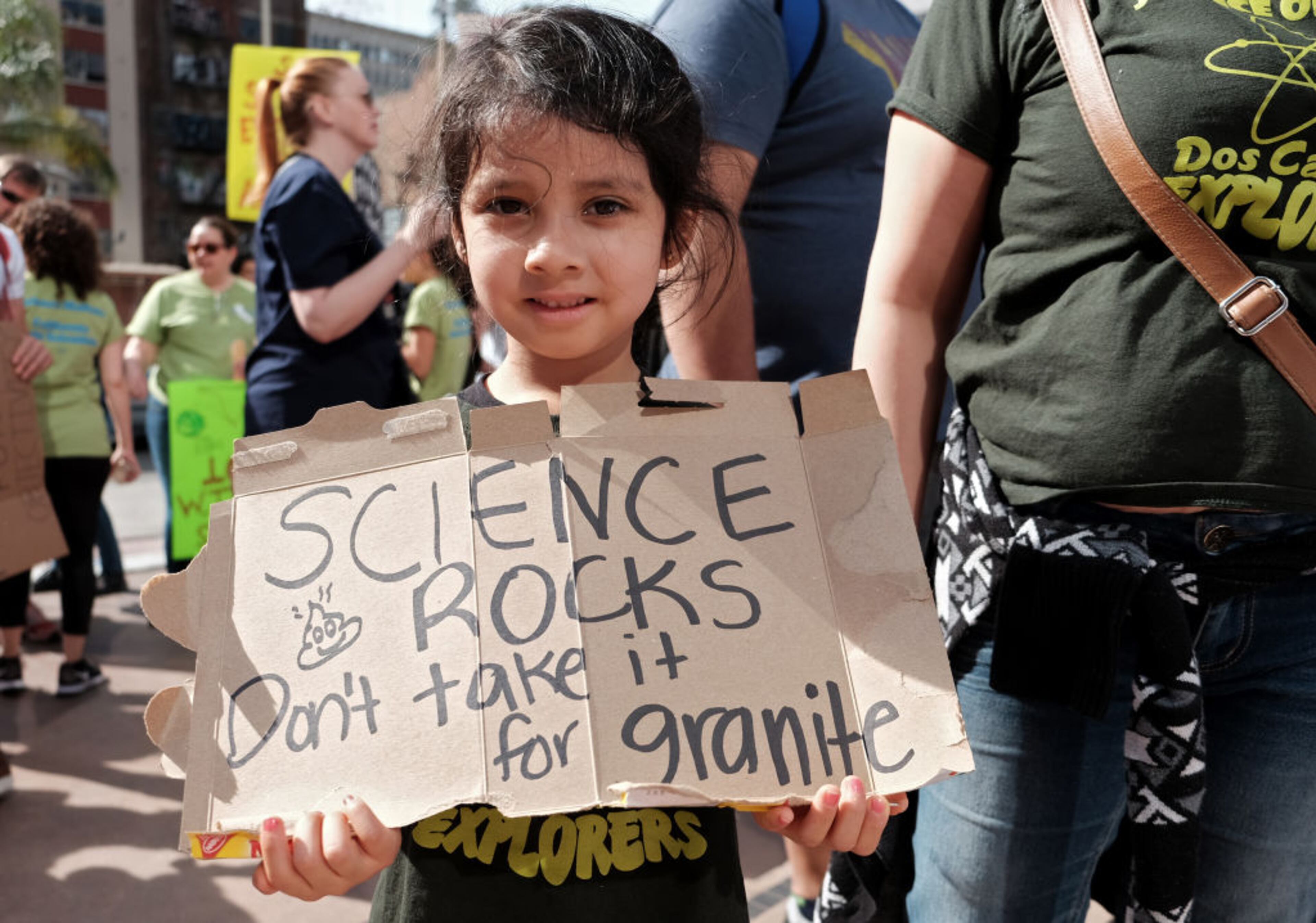 LOS ANGELES, CA - APRIL 22: A young girl marches with scientists and supporters in a March for Science on April 22, 2017 in Los Angeles, California. The event is being described as a call to support and safeguard the scientific community. (Photo by Sarah Morris/Getty Images)