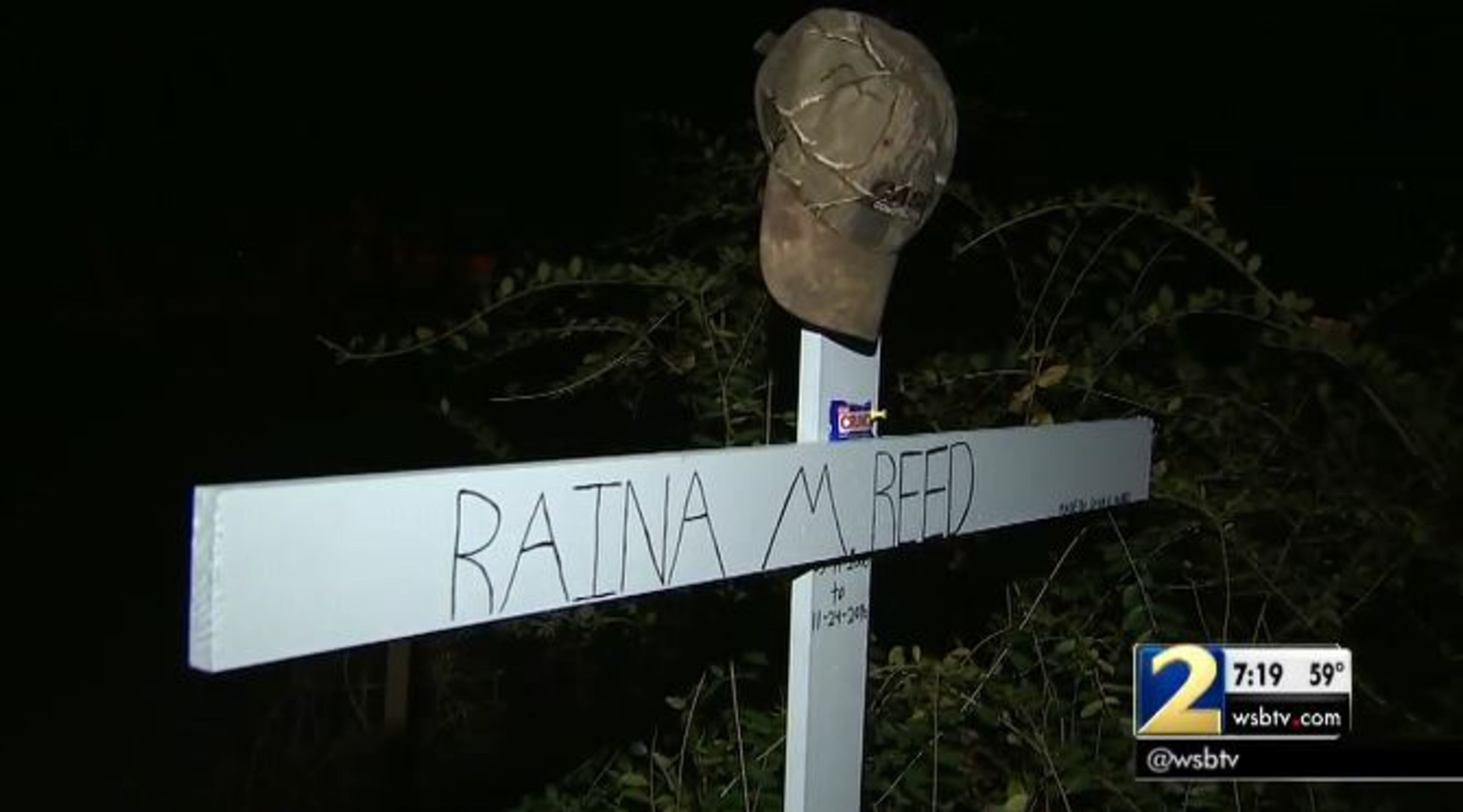 A memorial to Raina Reed near where she was killed in a car crash Thursday night. (Credit: Channel 2 Action News)